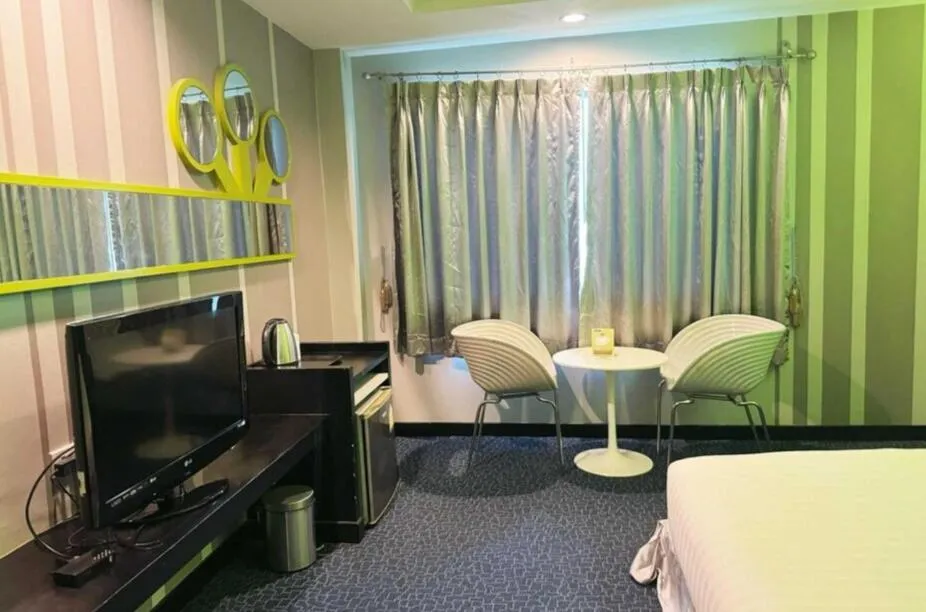 Bedroom in Capital O 75514 Vasidtee City Hotel (Suphanburi)