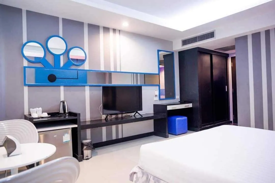 Bedroom in Capital O 75514 Vasidtee City Hotel (Suphanburi)