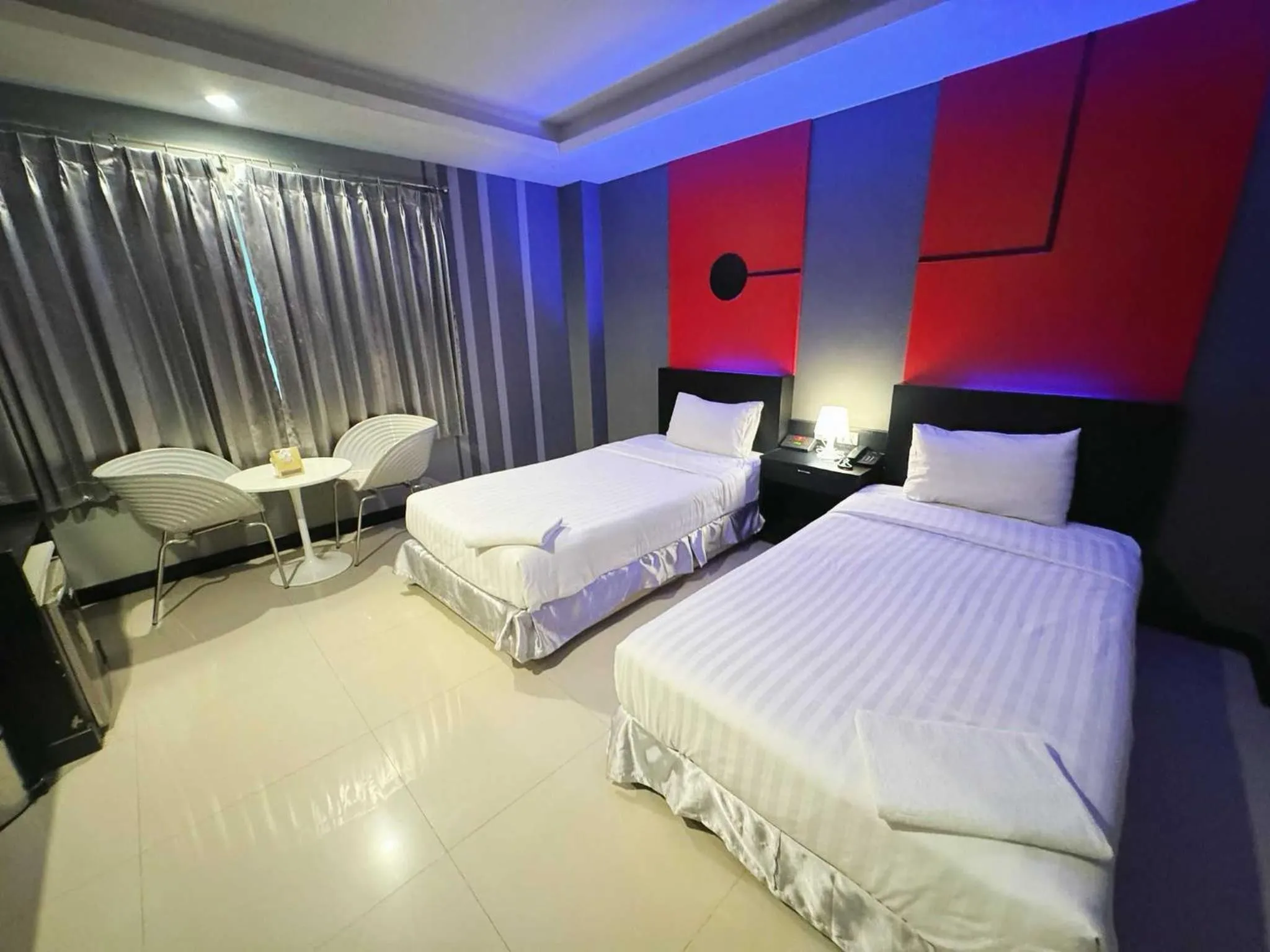Bedroom in Capital O 75514 Vasidtee City Hotel (Suphanburi)