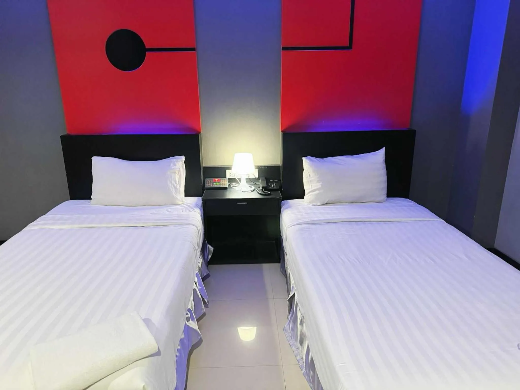 Bedroom in Capital O 75514 Vasidtee City Hotel (Suphanburi)