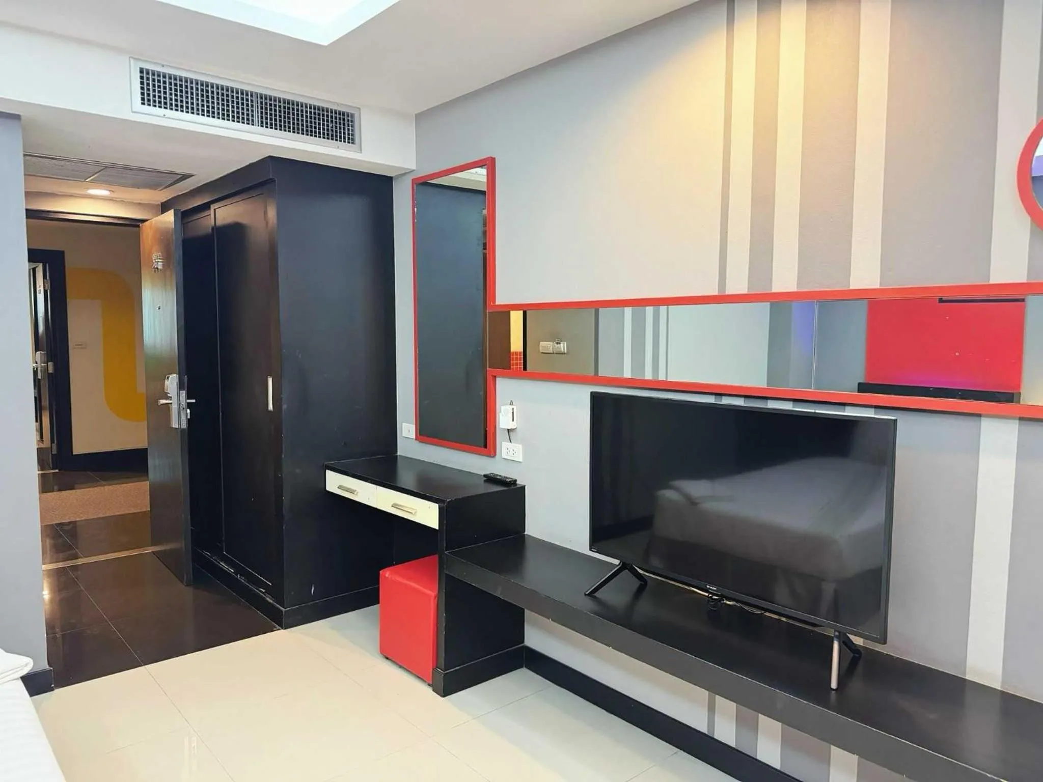 Bedroom in Capital O 75514 Vasidtee City Hotel (Suphanburi)