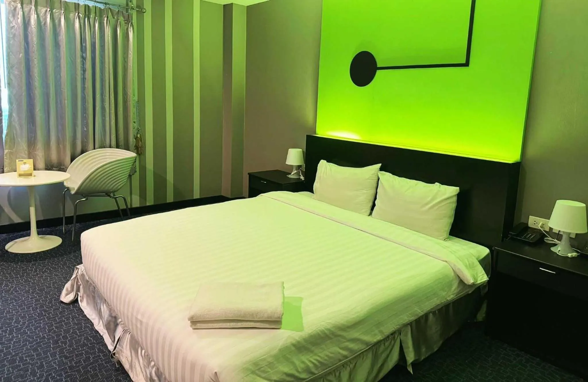 Bedroom in Capital O 75514 Vasidtee City Hotel (Suphanburi)