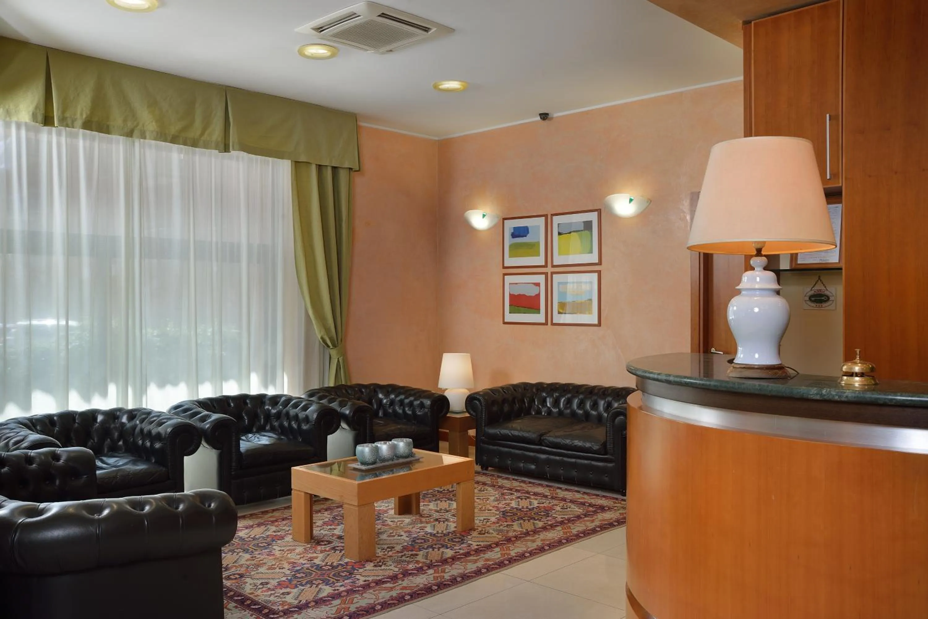 Lobby or reception in Astor Hotel