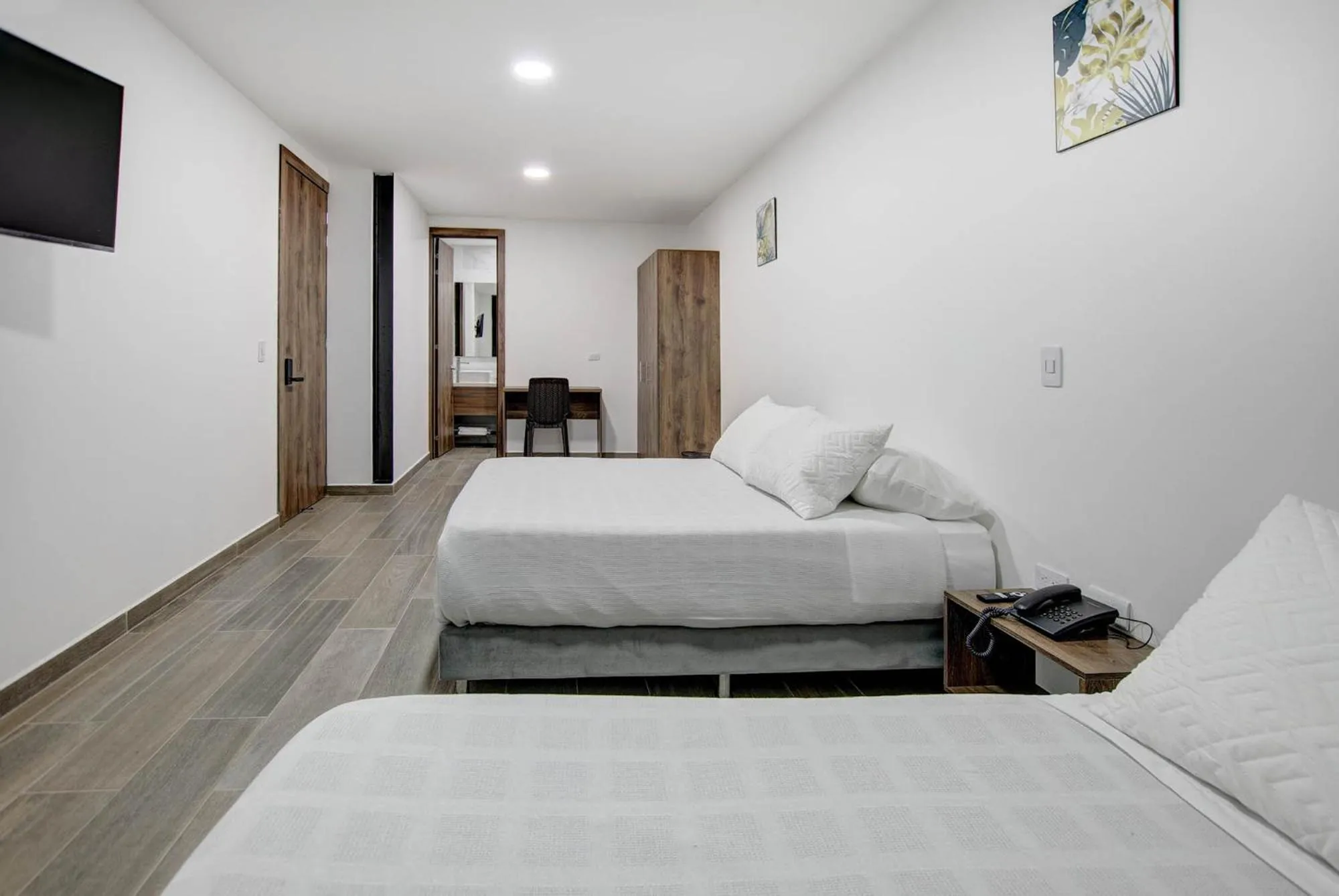 Bed in Xliving Host and Rooms