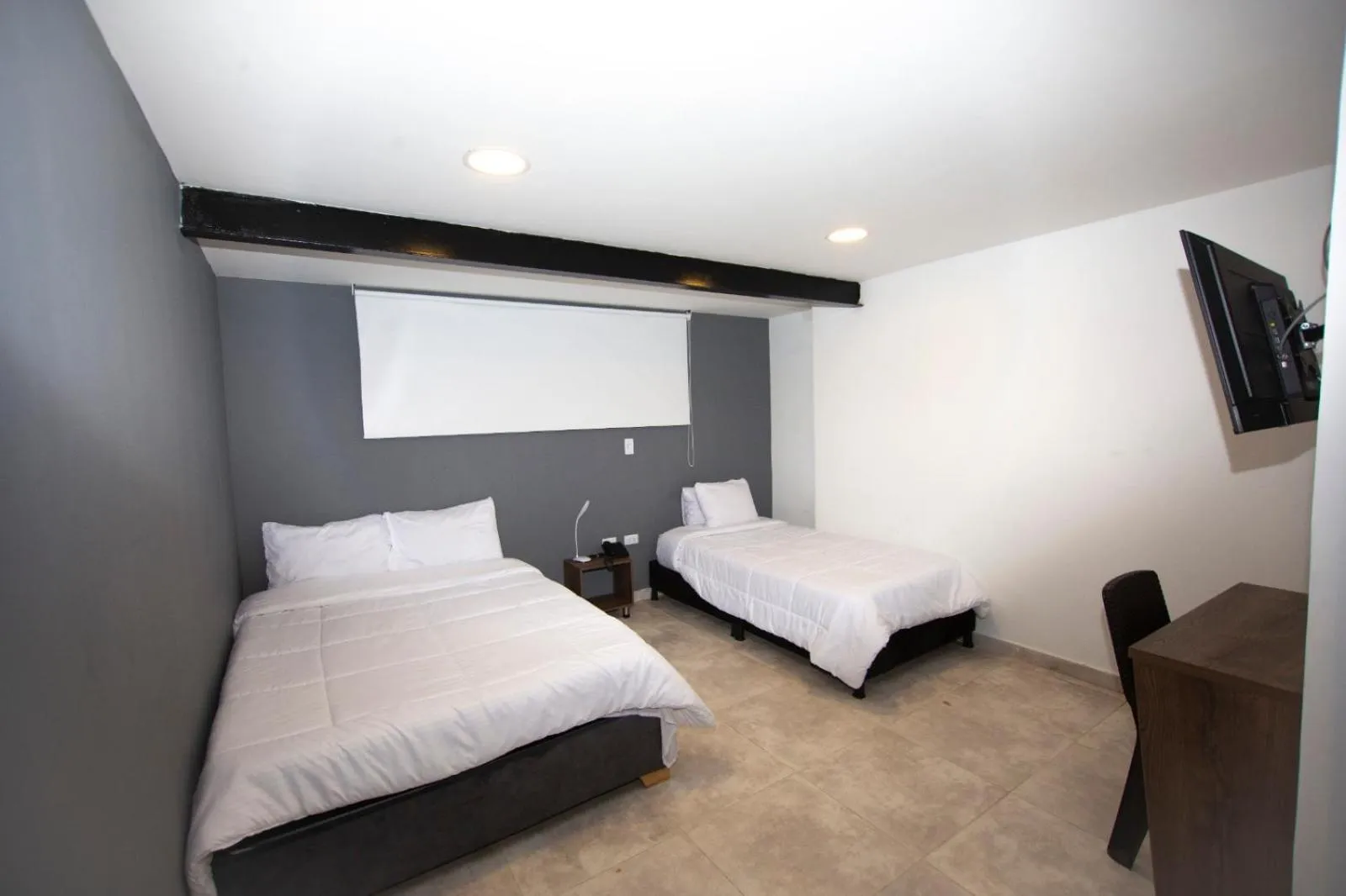 Bed in Xliving Host and Rooms