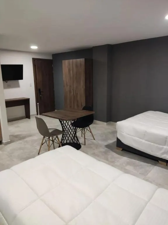 Bed in Xliving Host and Rooms