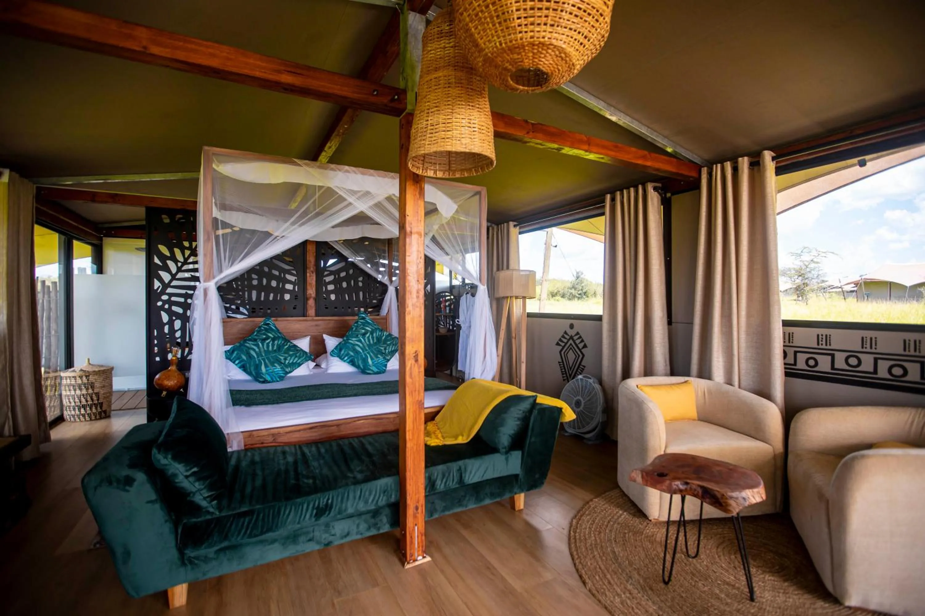 Bed in Escarpment Serengeti Luxury Camp