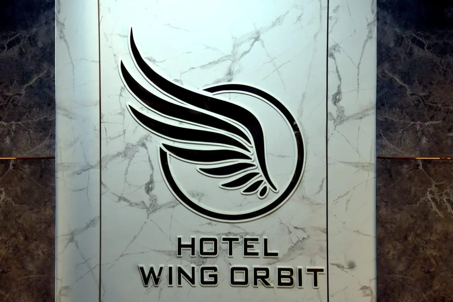 Logo/Certificate/Sign in Hotel Wing Orbit