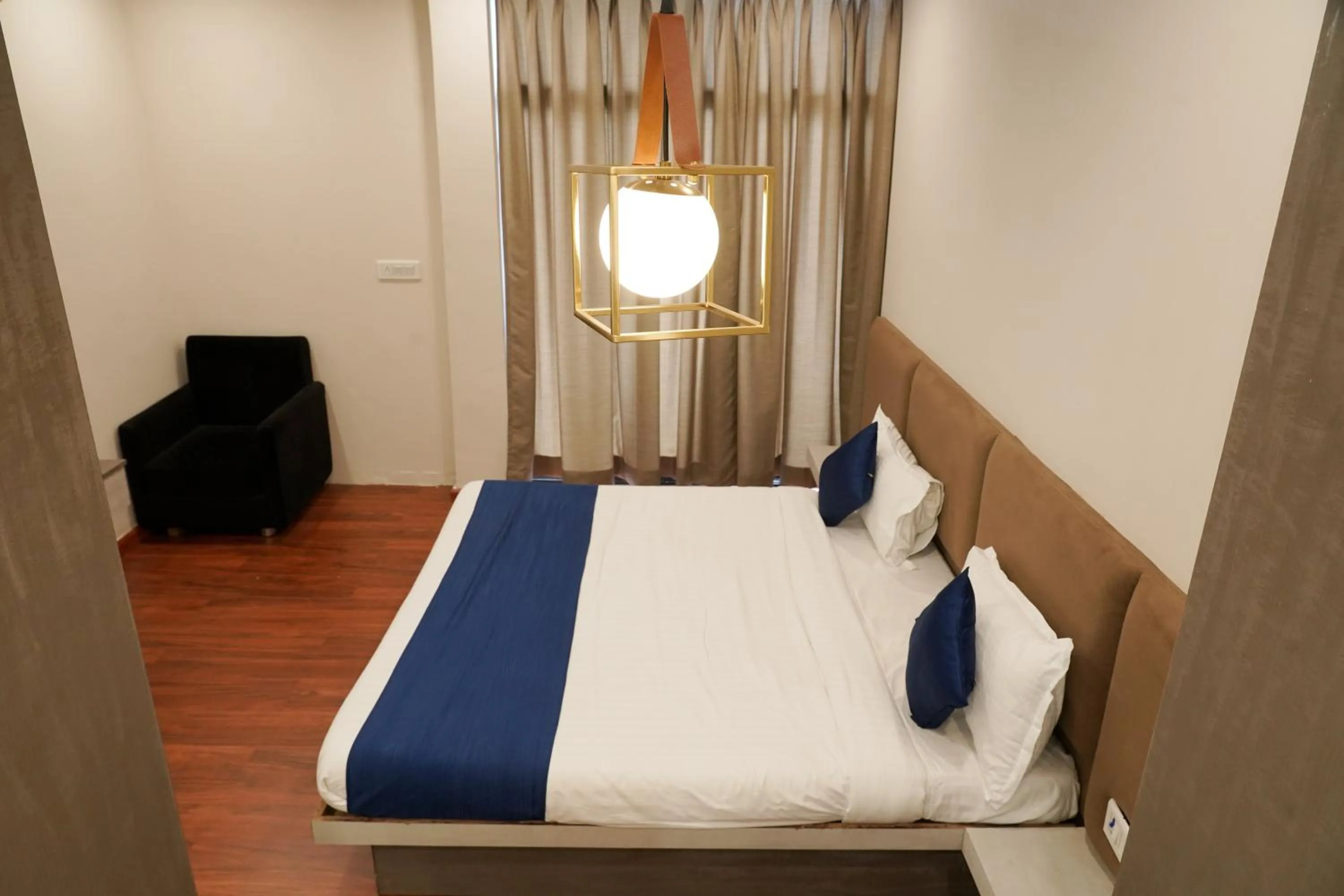 Photo of the whole room, Bed in Hotel Suryodaya