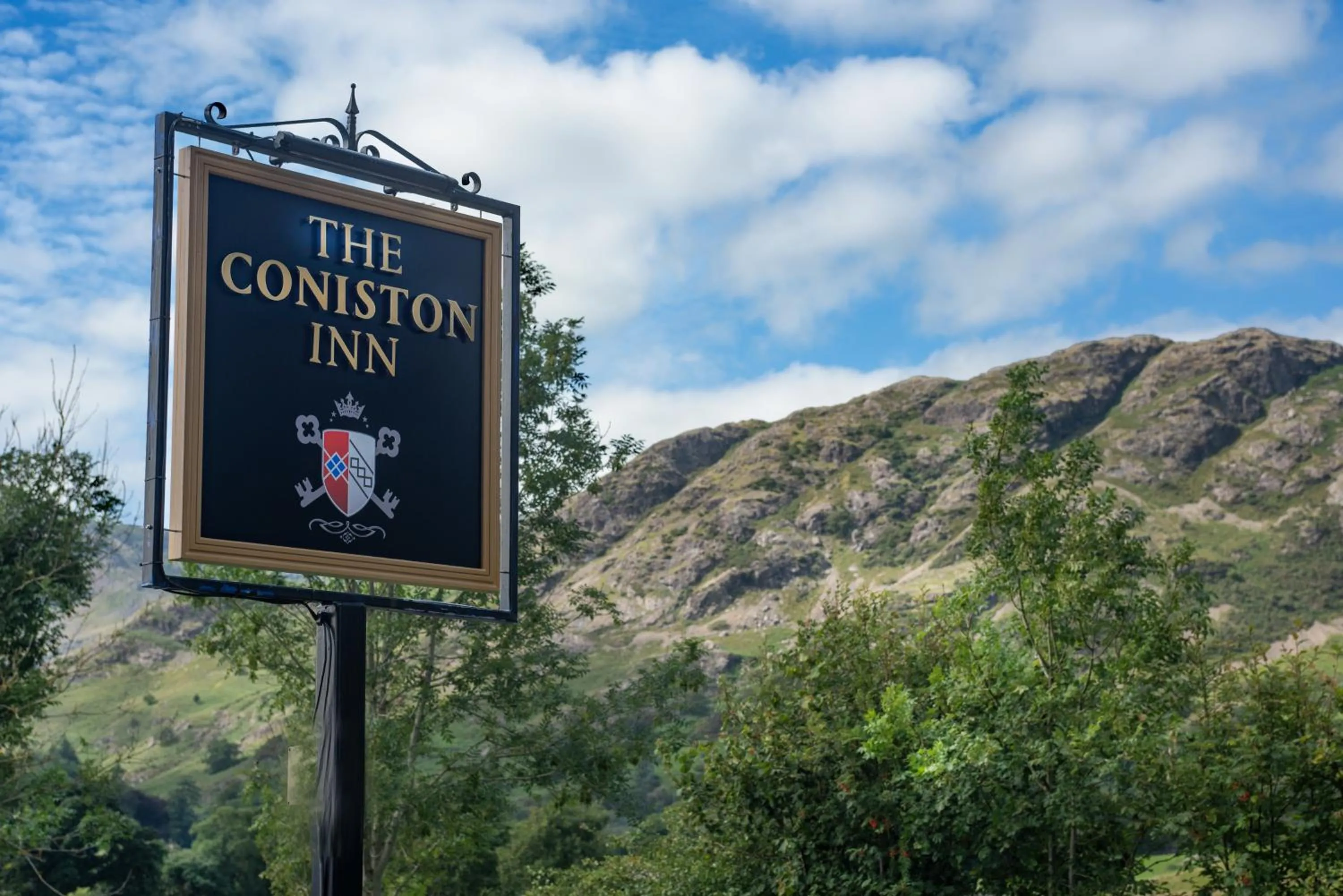 Property logo or sign in The Coniston Inn - The Inn Collection Group