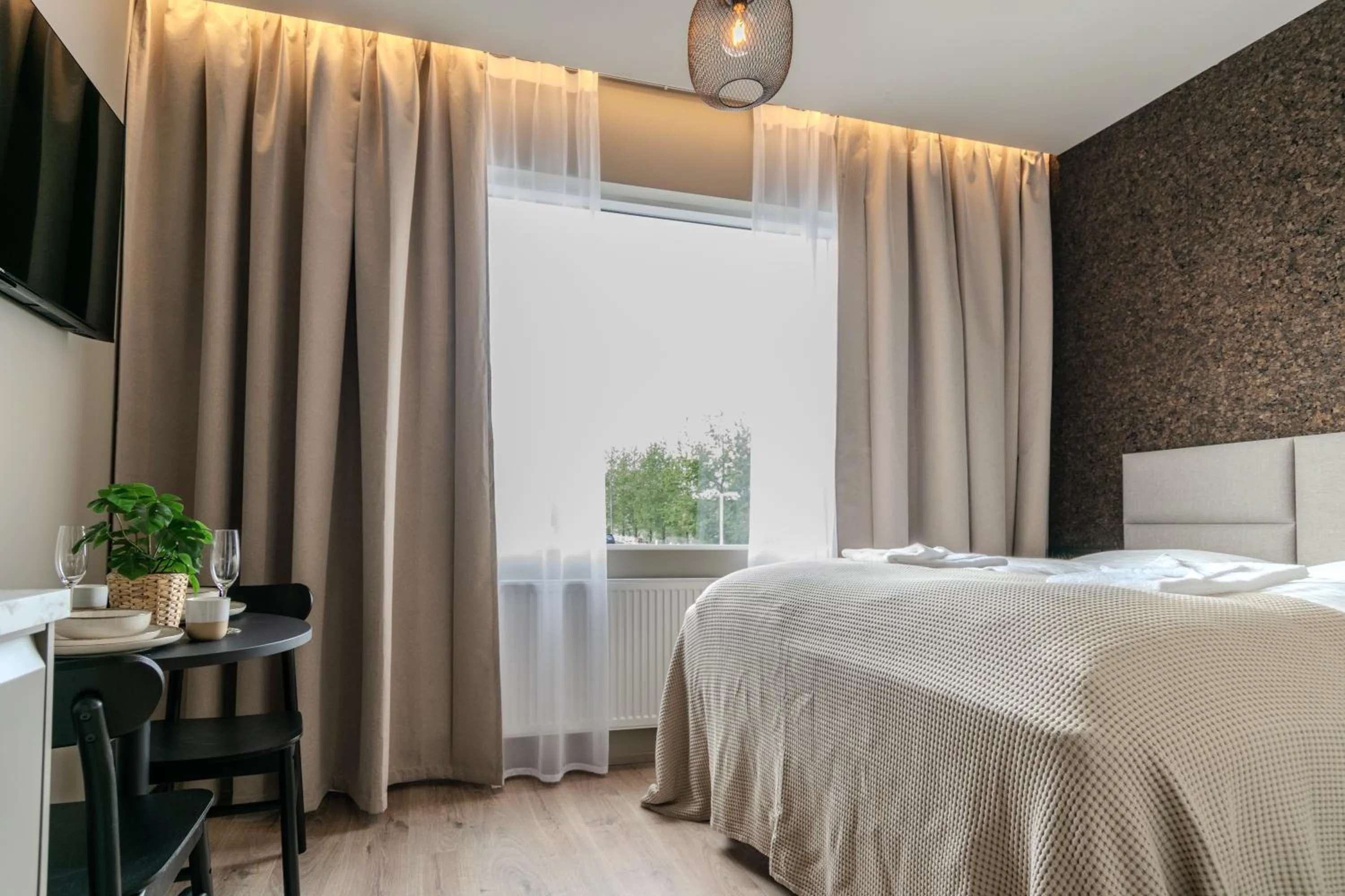 Bed in Frost Apartments by Heimaleiga