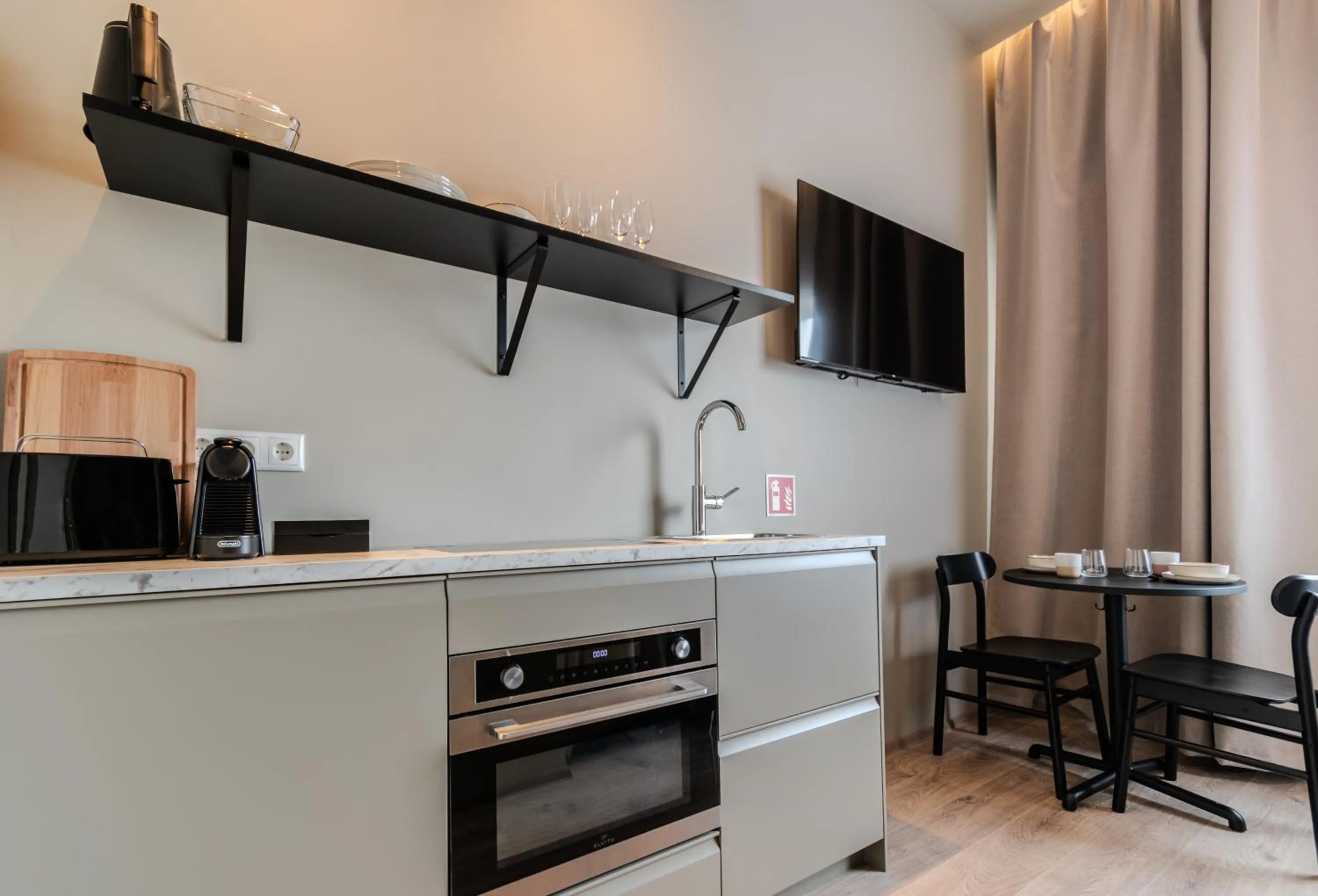 TV and multimedia in Frost Apartments by Heimaleiga