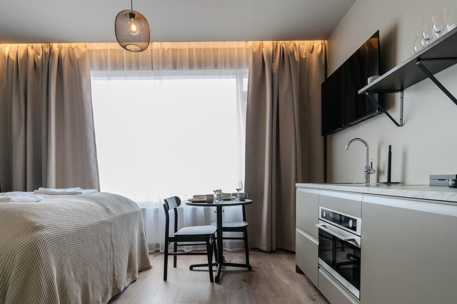 Bed in Frost Apartments by Heimaleiga