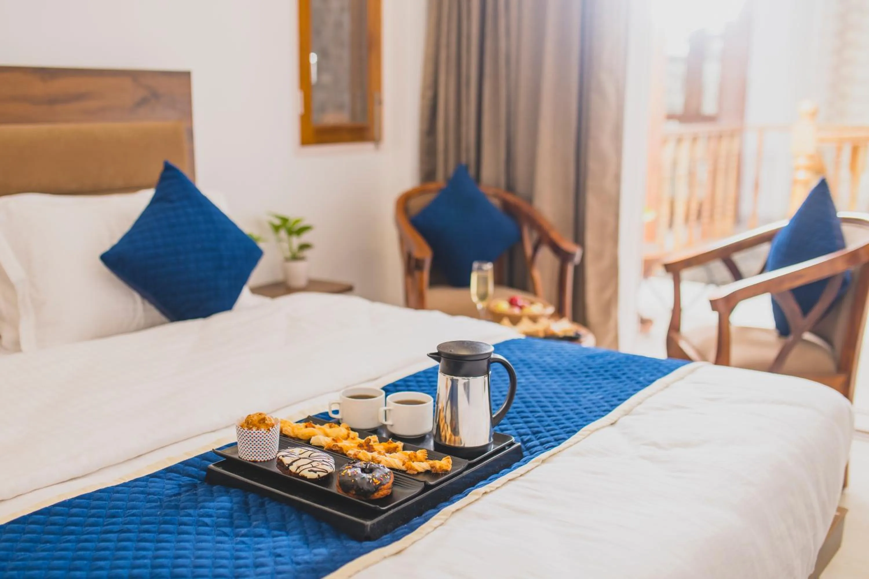 Bedroom in Navya Stays