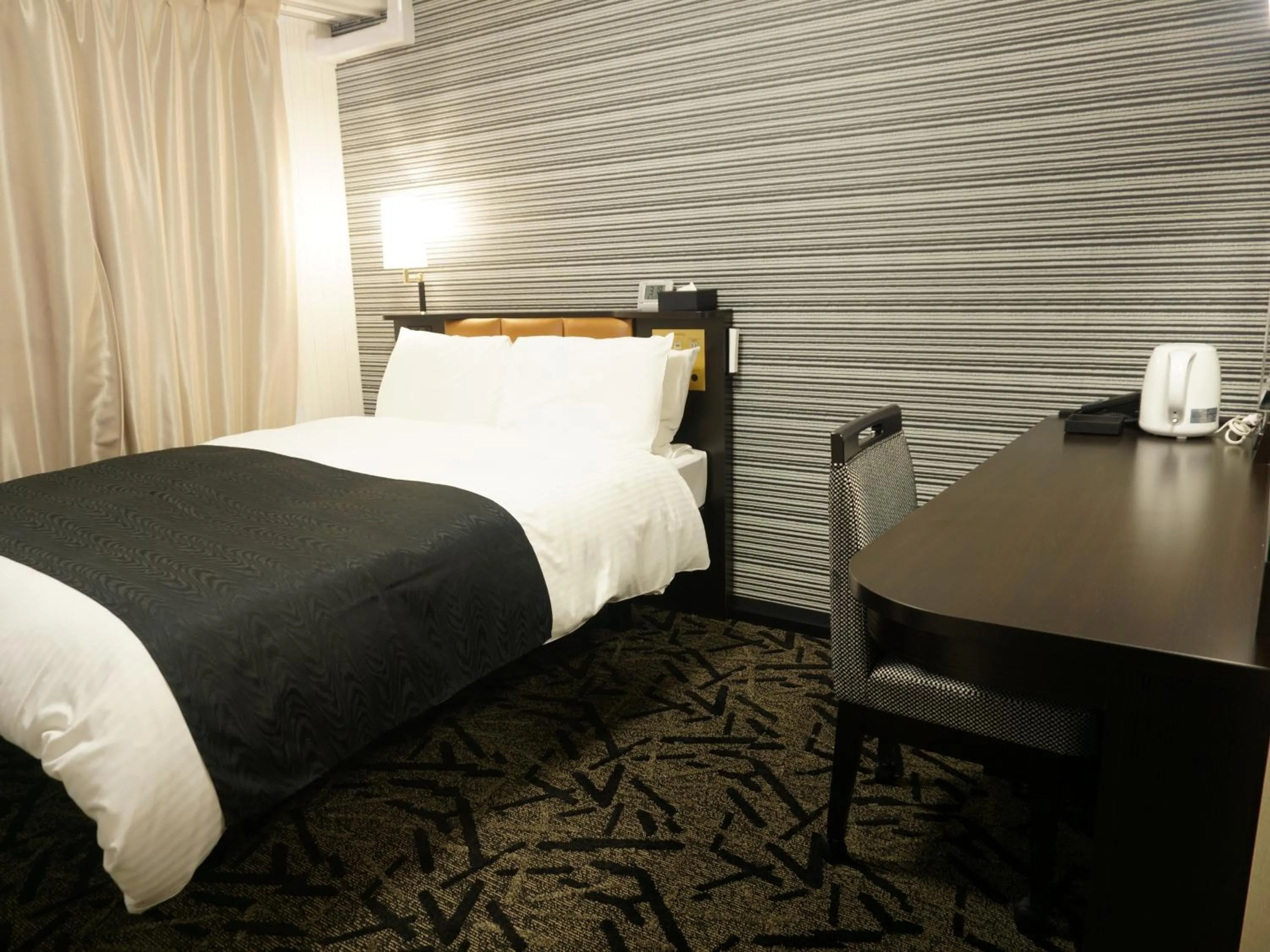 Bed in APA Hotel Hachinohe Chuo