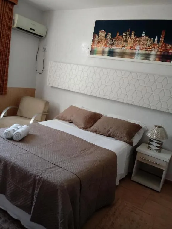 Bed in Pousada Areia da Praia