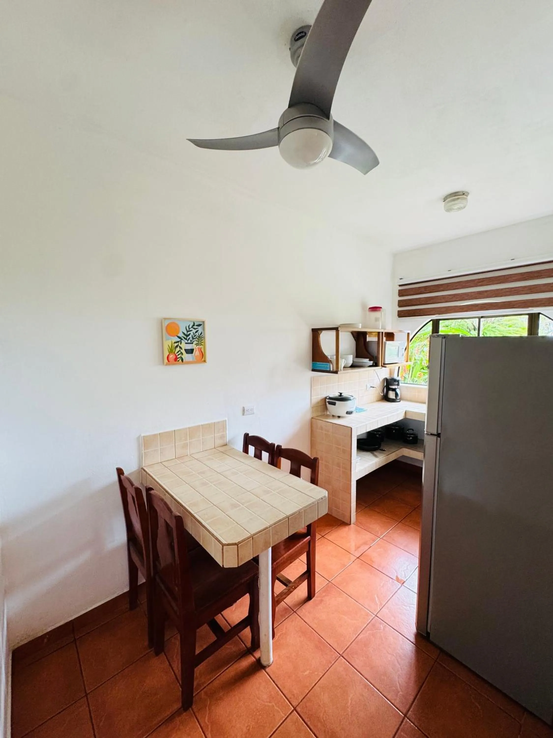 Kitchen or kitchenette, Bed in Apartotel Flamboyant