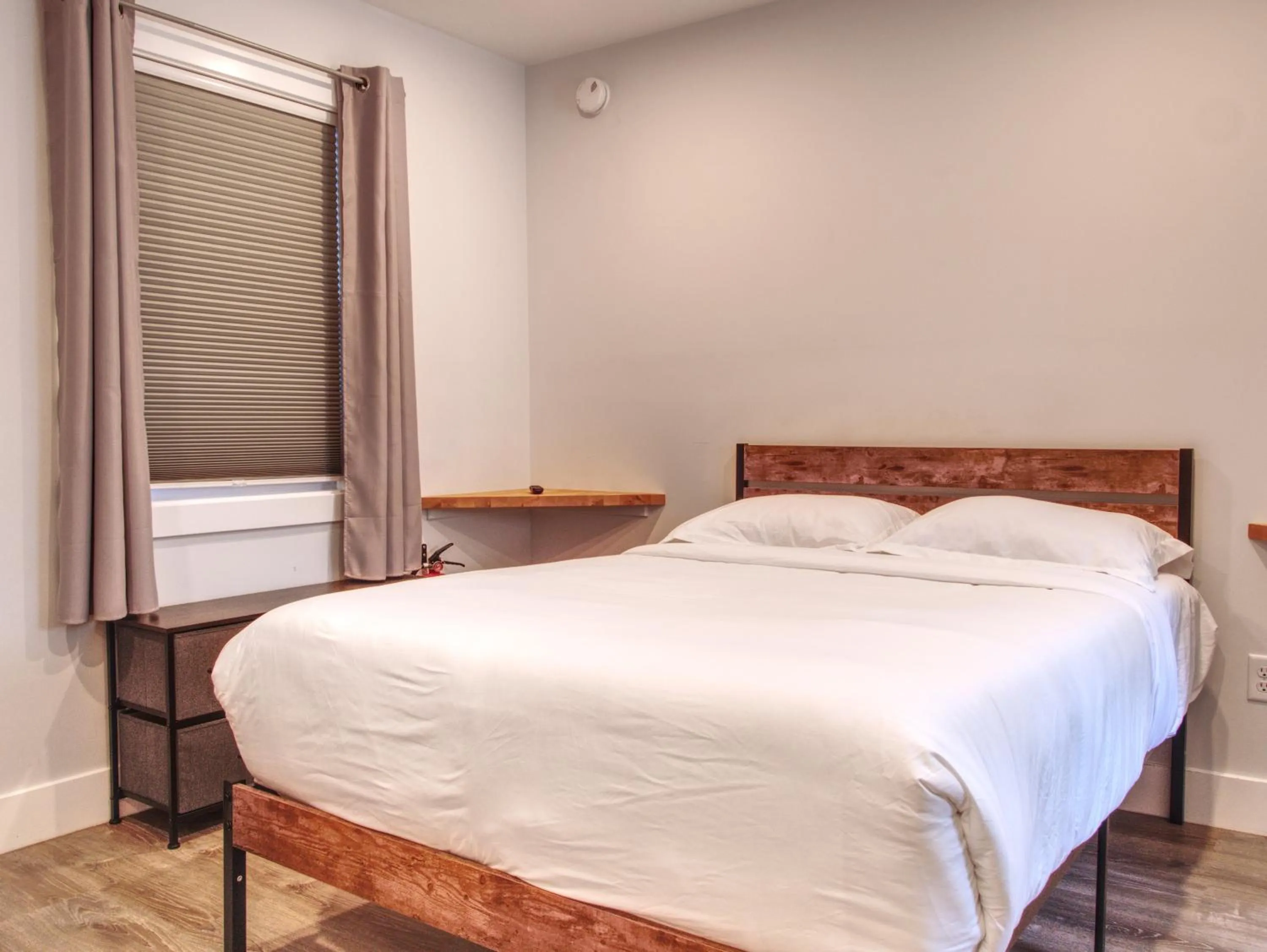 Bed in Vermont Suites