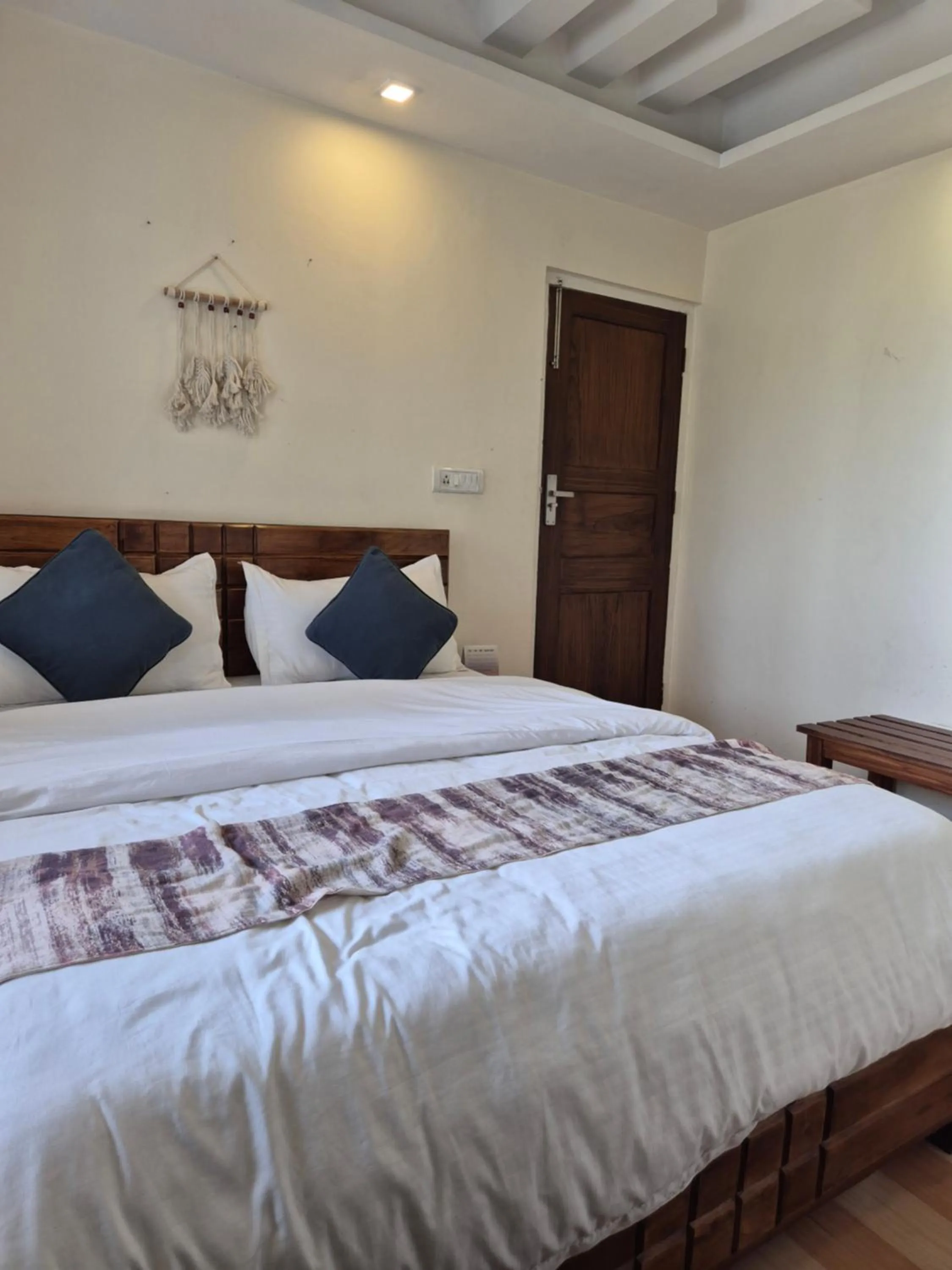 Bed in The Coverpage Boutique Stays Mussoorie