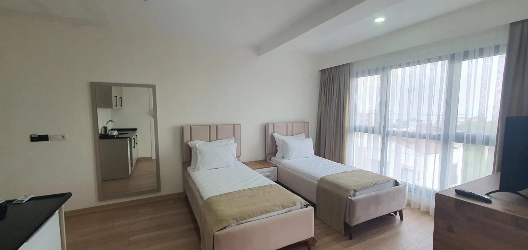 TV and multimedia, Bed in Petra Port Hotel