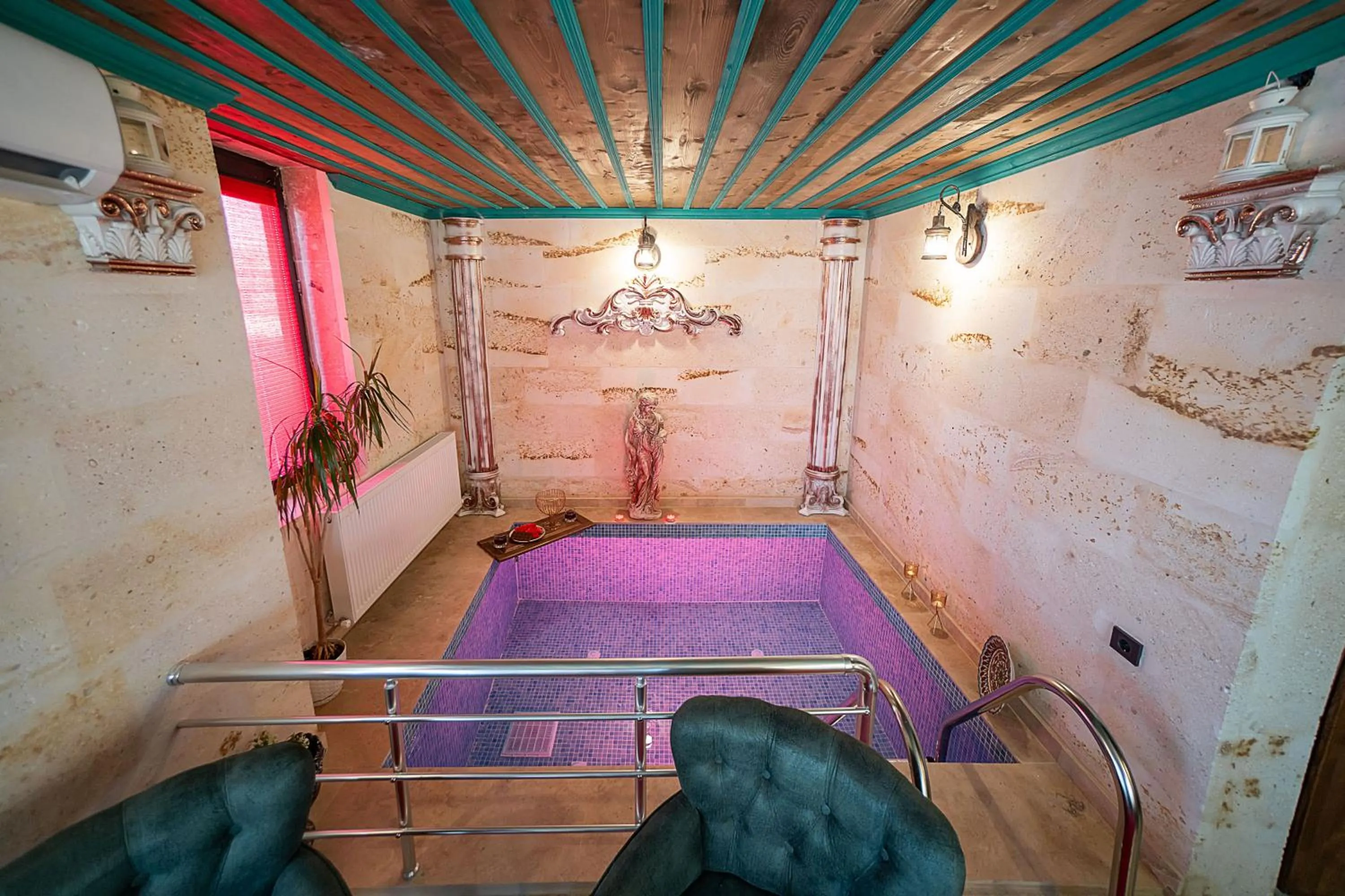 Seating area, Bed in Abra Stone House