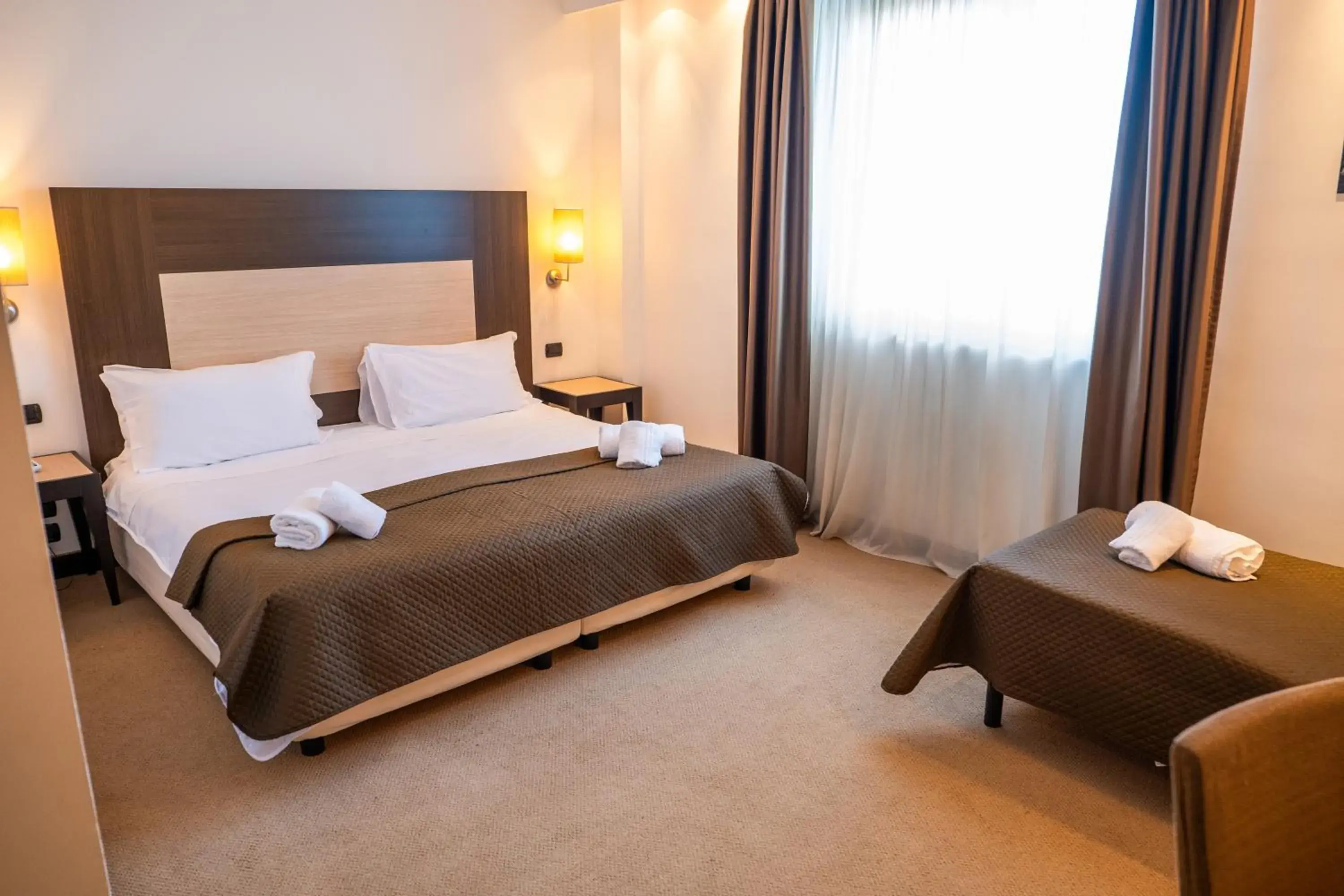 Comfort Triple Room in NSM Hotel Palace Lucera Comfort Triple Room in NSM Hotel Palace Lucera