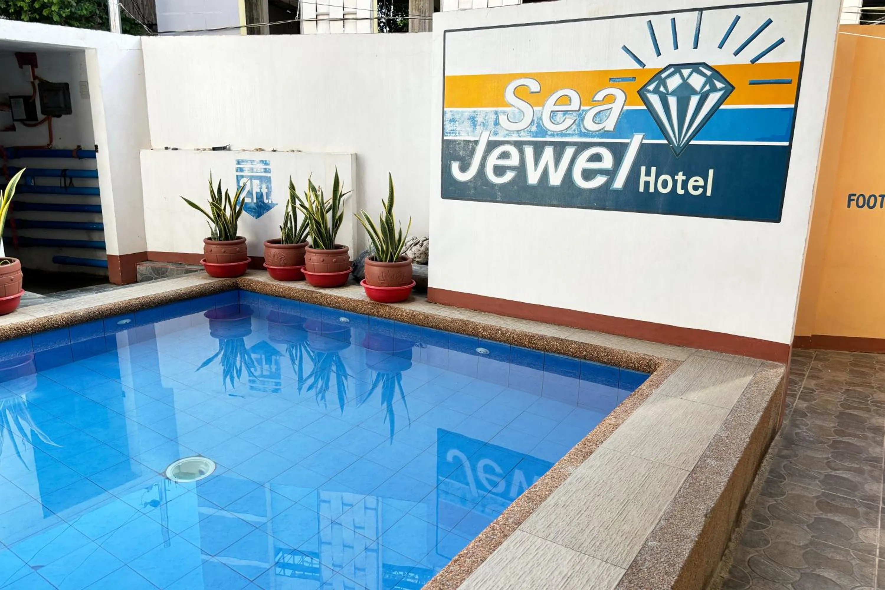 Swimming pool in Sea Jewel Hotel Puerto Galera powered by Cocotel