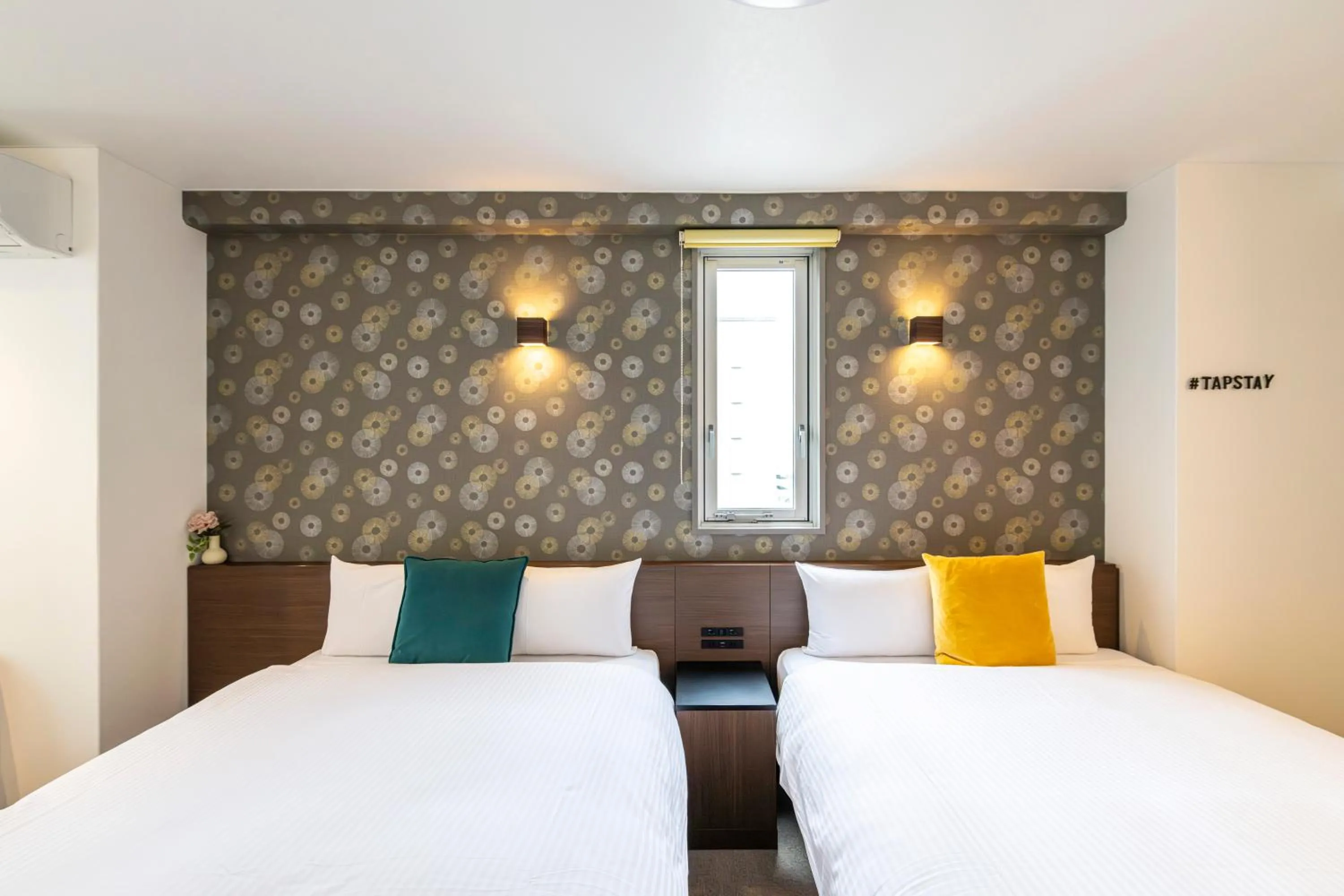 Bed in TapStay Hotel