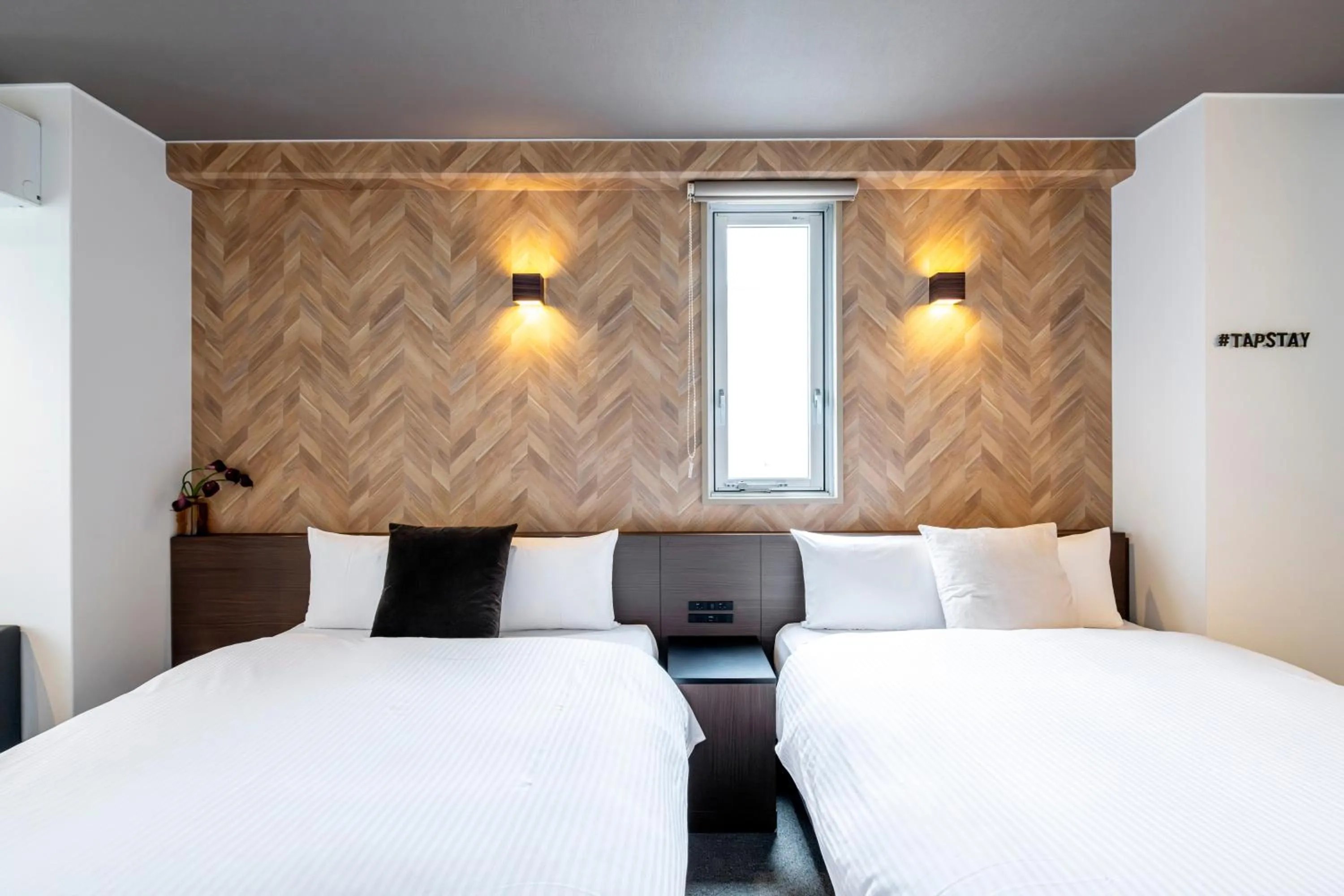 Bed in TapStay Hotel