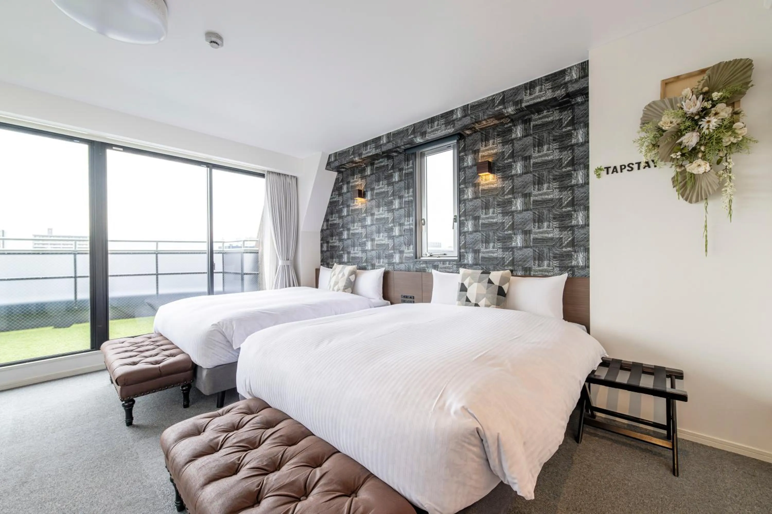 Bed in TapStay Hotel