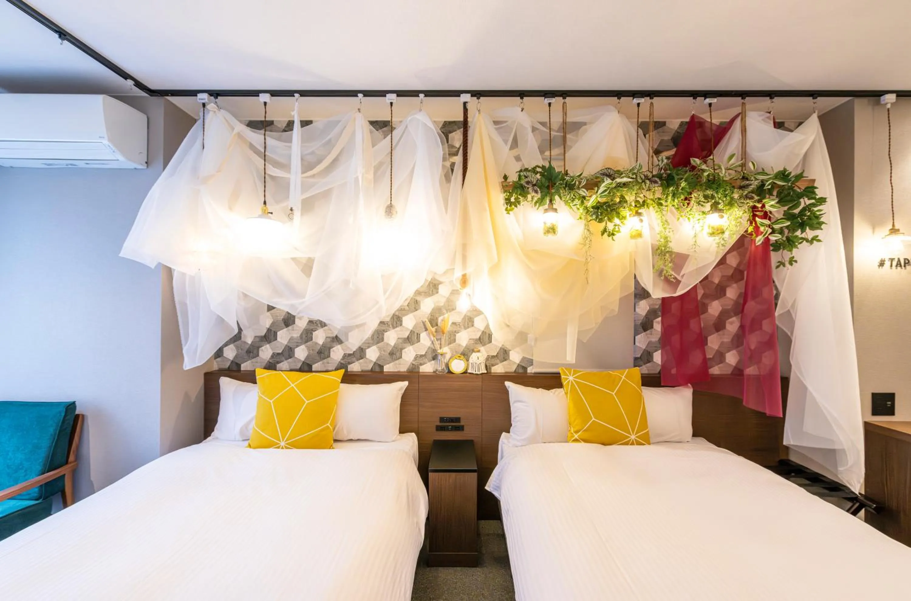 Bed in TapStay Hotel