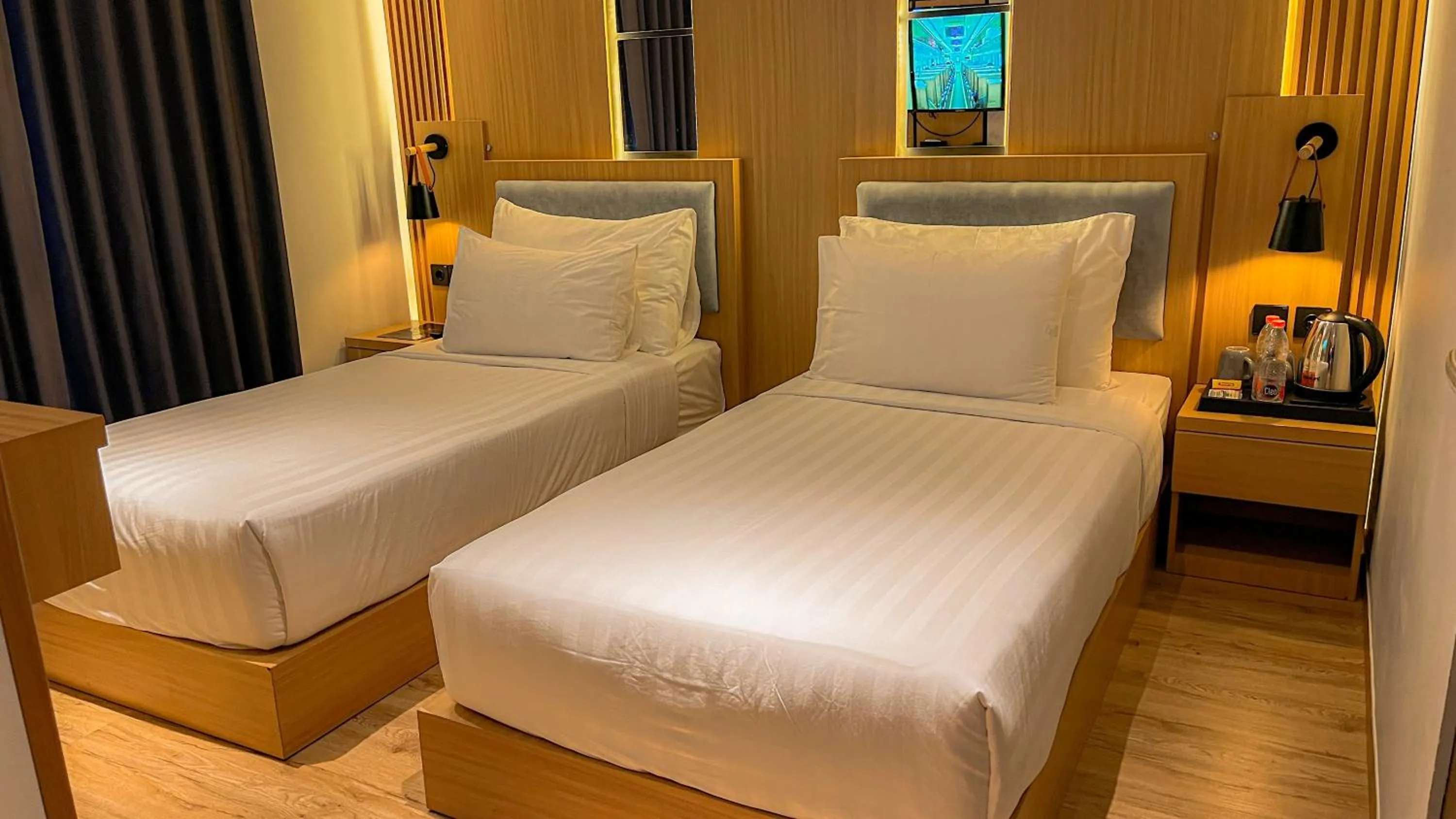 Bed in Eagle Hotel Wonosobo, Azana Hotels Collection
