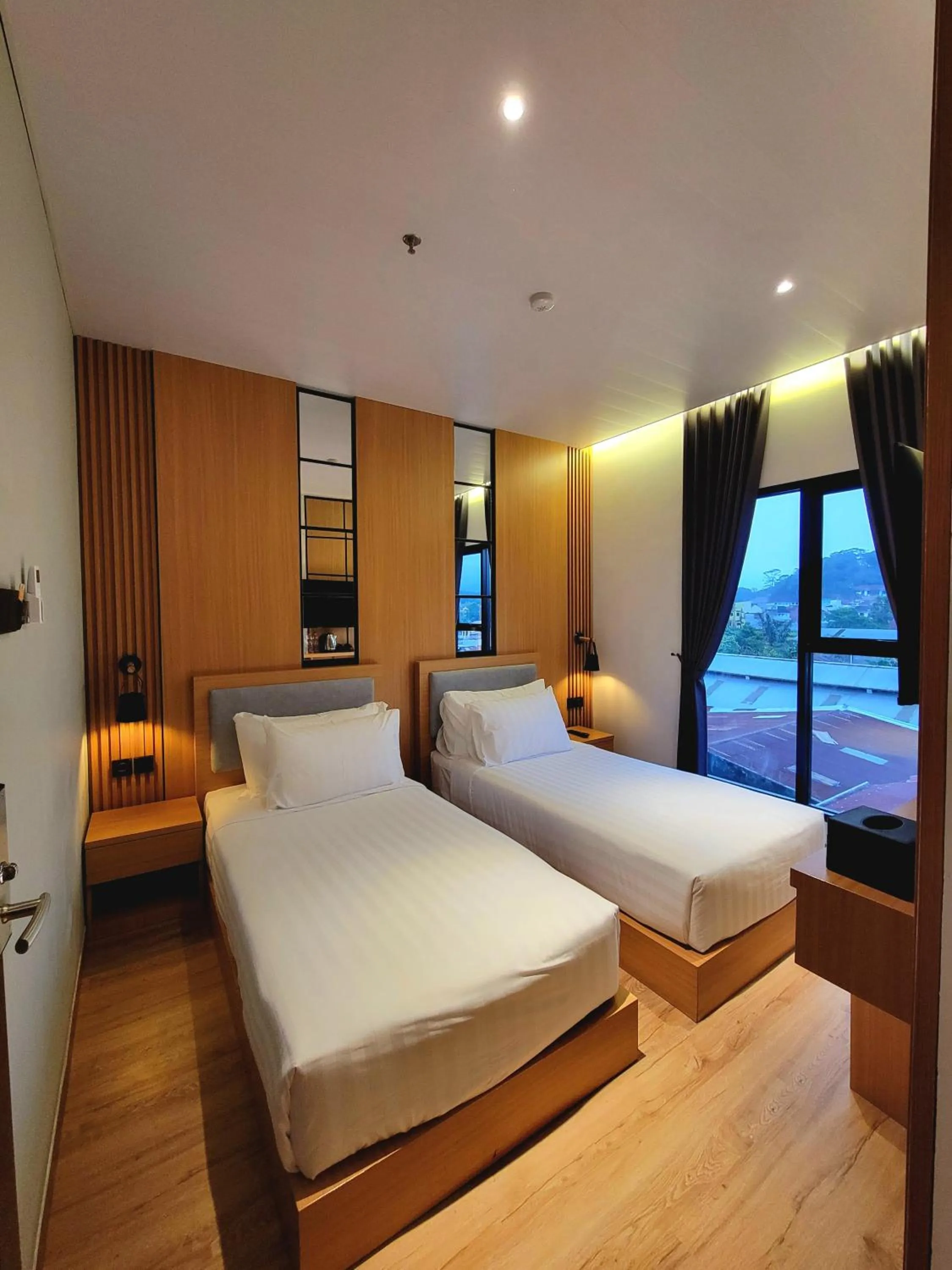 Bed in Eagle Hotel Wonosobo, Azana Hotels Collection
