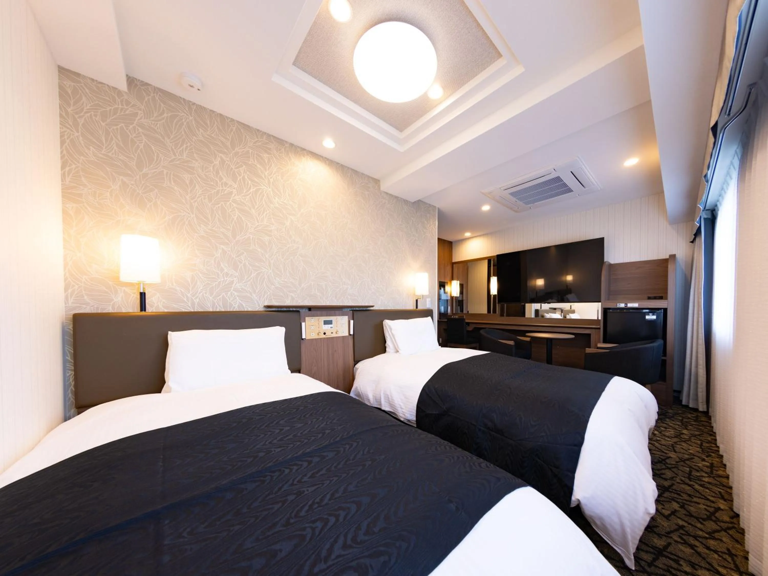 Photo of the whole room, Bed in APA Hotel Hiroshima Ekimae Stadiumguchi