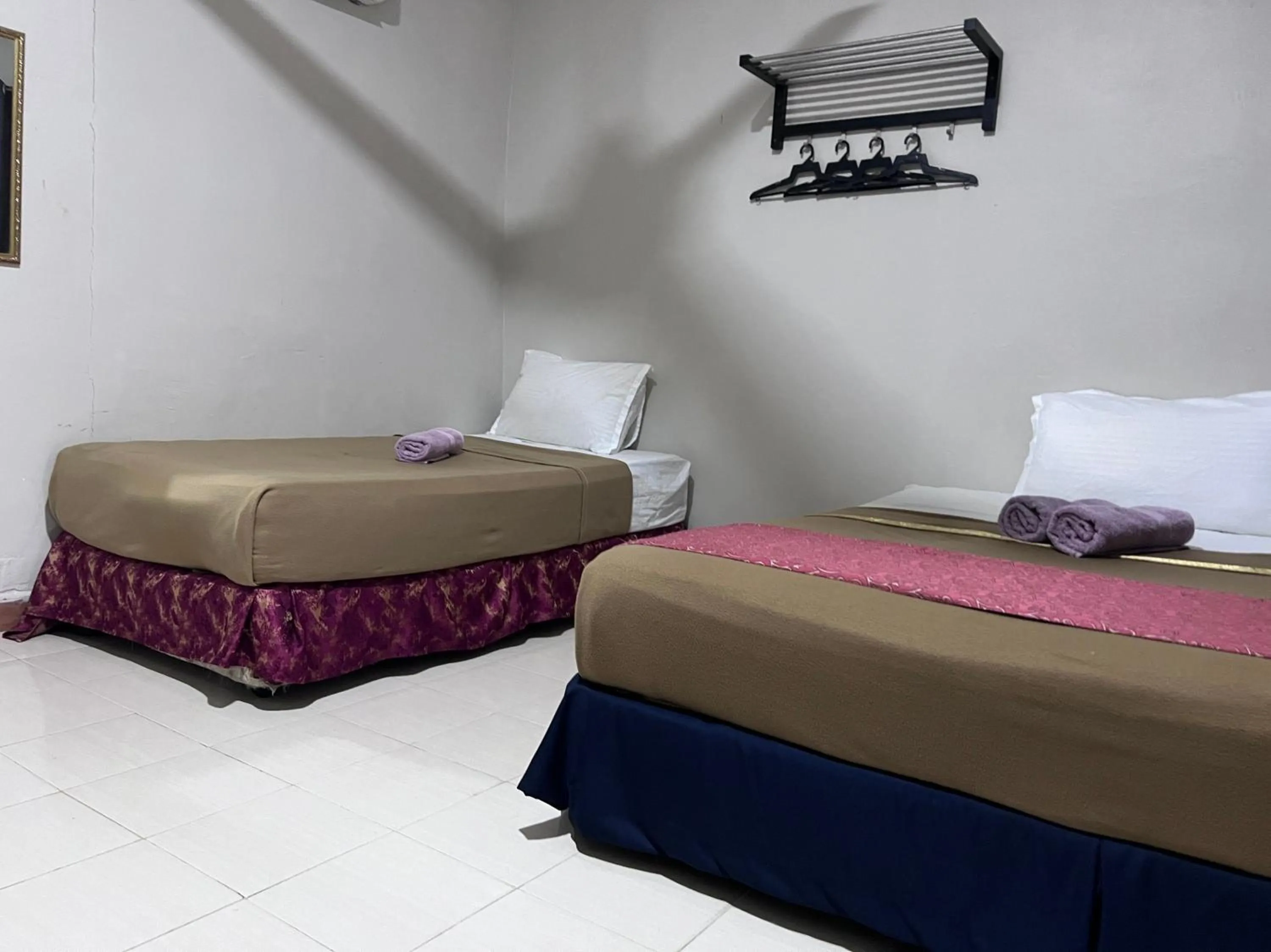 Bedroom, Bed in Capital O 91017 Tuba Beach Resort @ Pulau Tuba