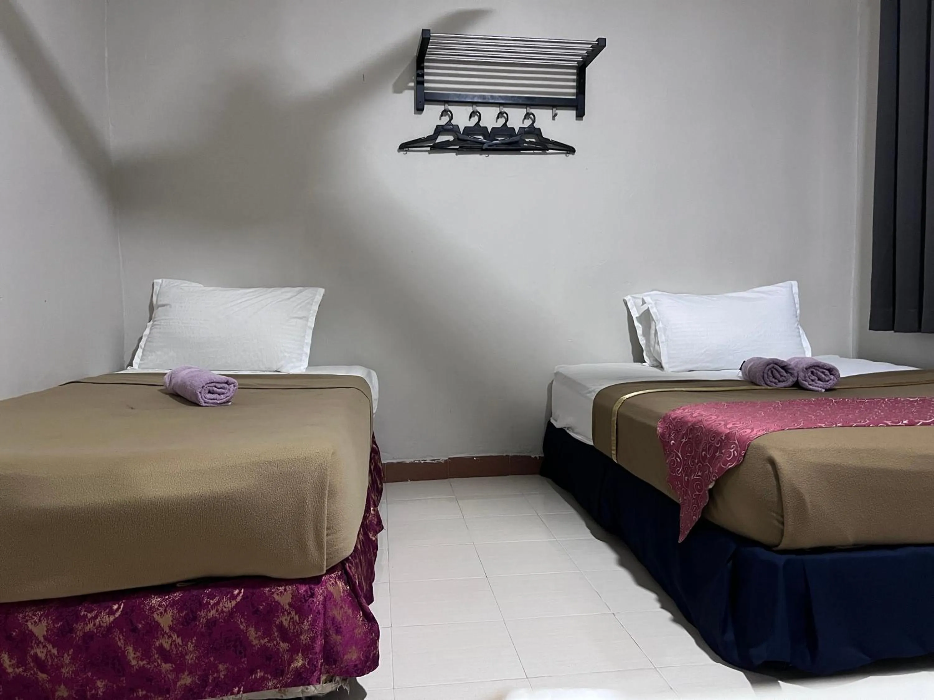 Bedroom, Bed in Capital O 91017 Tuba Beach Resort @ Pulau Tuba