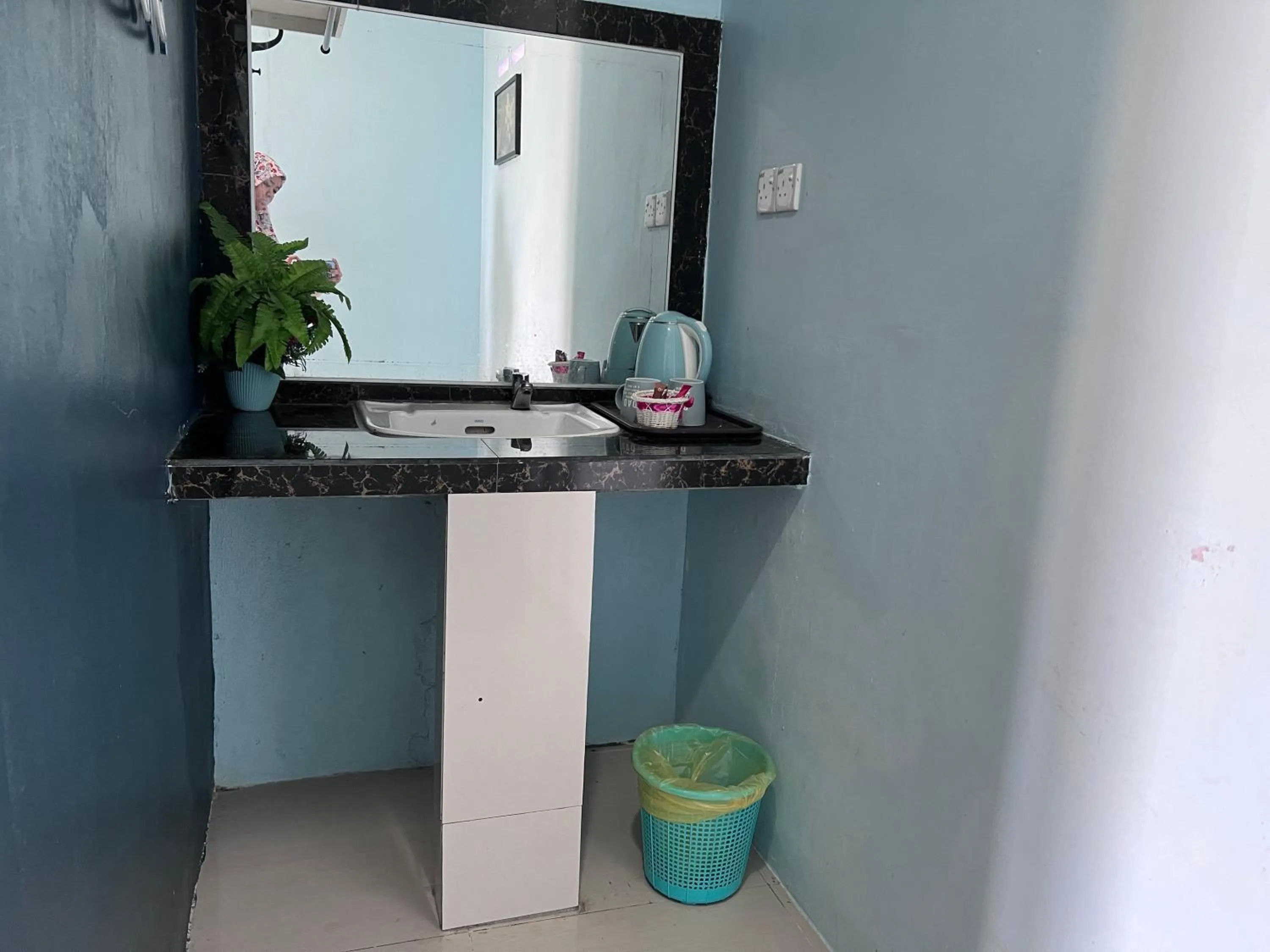 Bathroom in Capital O 91017 Tuba Beach Resort @ Pulau Tuba