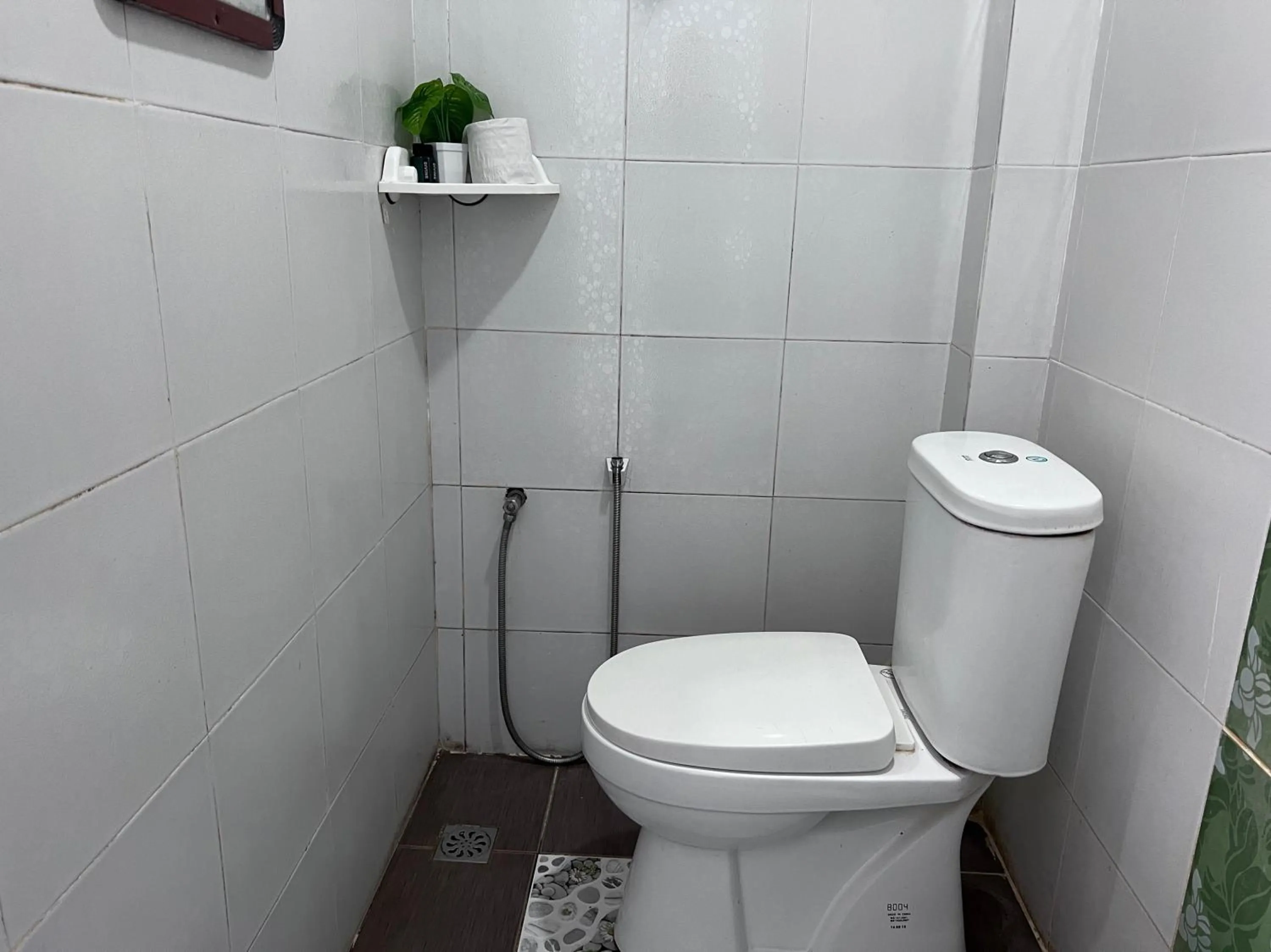 Bathroom in Capital O 91017 Tuba Beach Resort @ Pulau Tuba