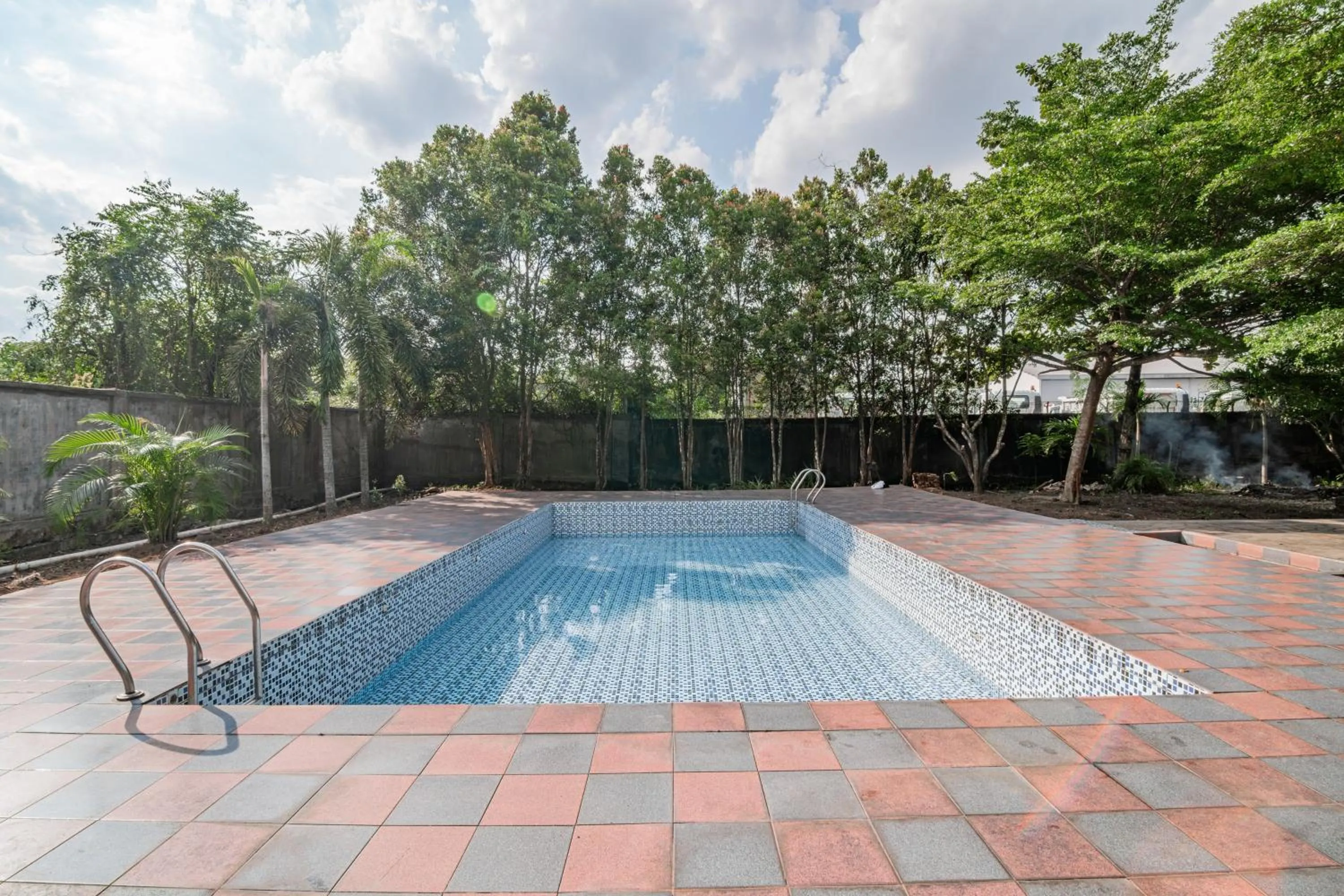 Swimming pool in Collection O Pusat Kota Pekanbaru Near Mall Ska Formerly Hotel Olgaria