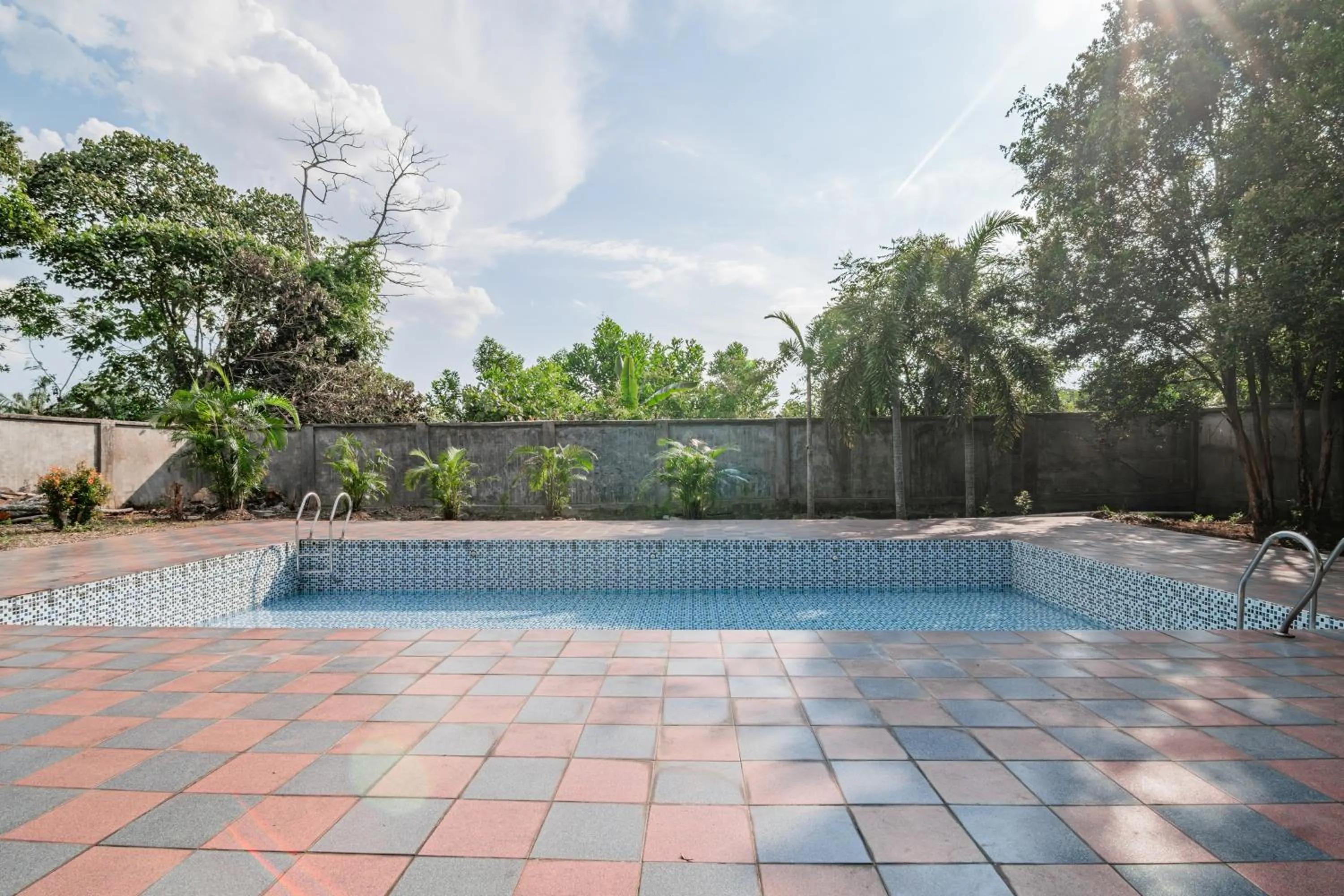 Swimming pool in Collection O Pusat Kota Pekanbaru Near Mall Ska Formerly Hotel Olgaria