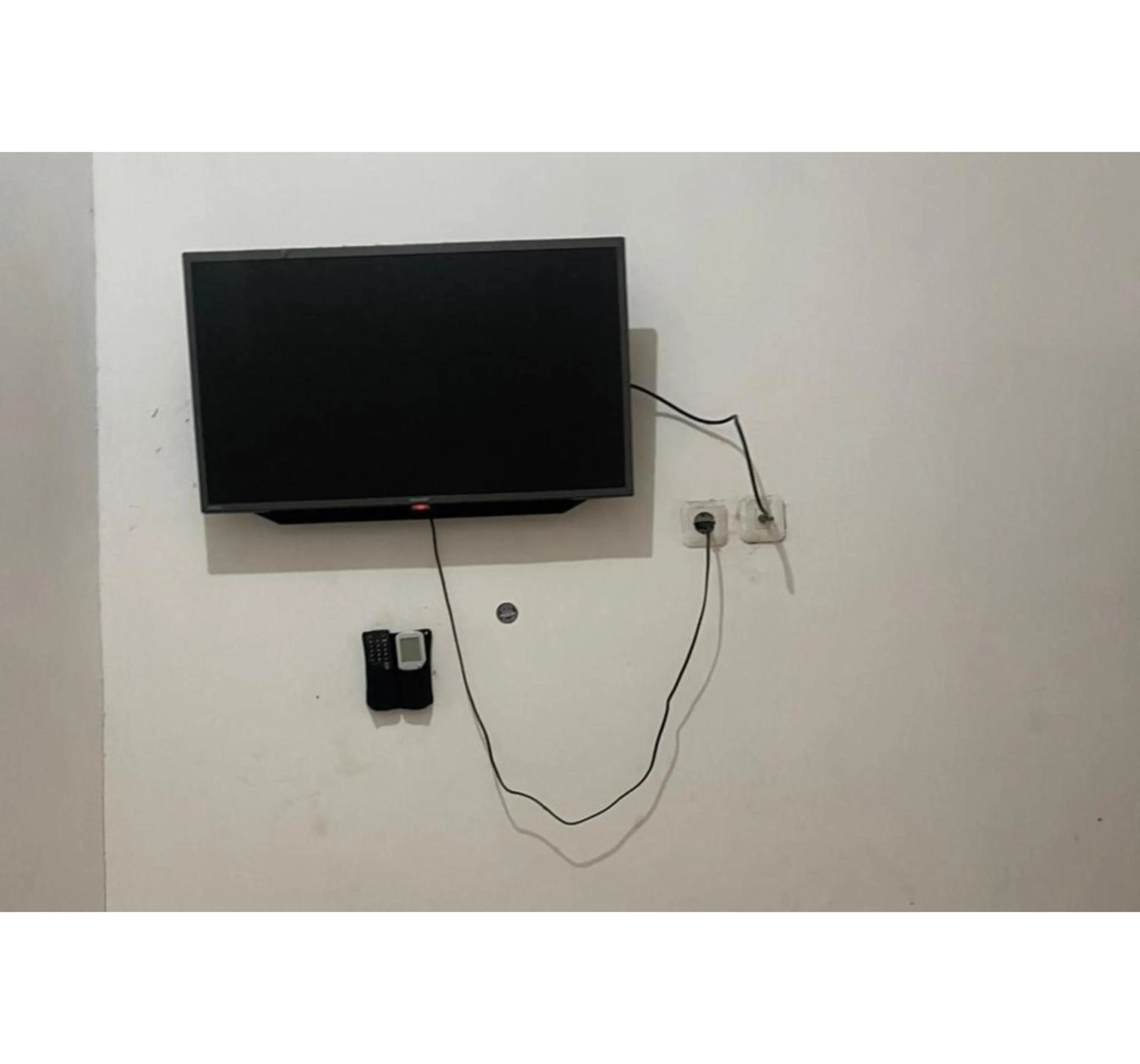 Bedroom in Hotel O Ratha Guest House Syariah