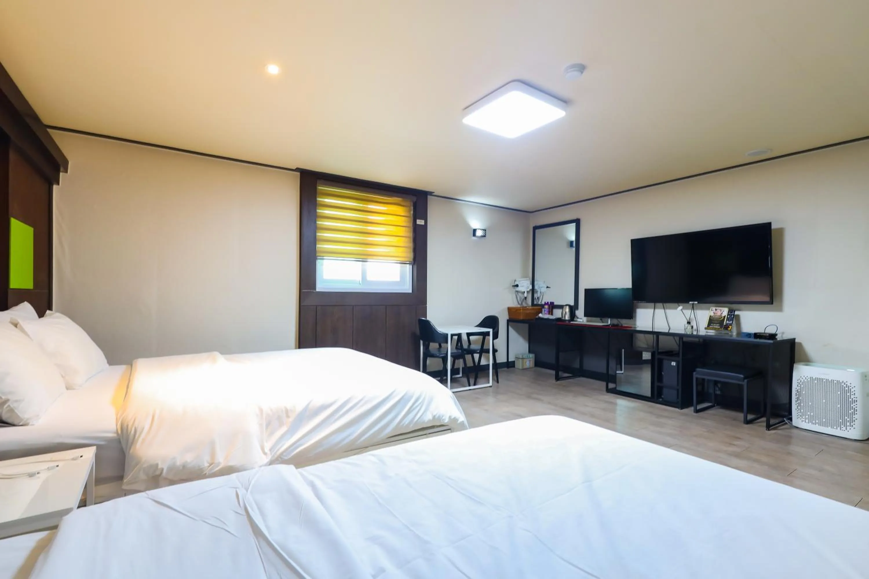 Bed in FromH J Hotel Osan