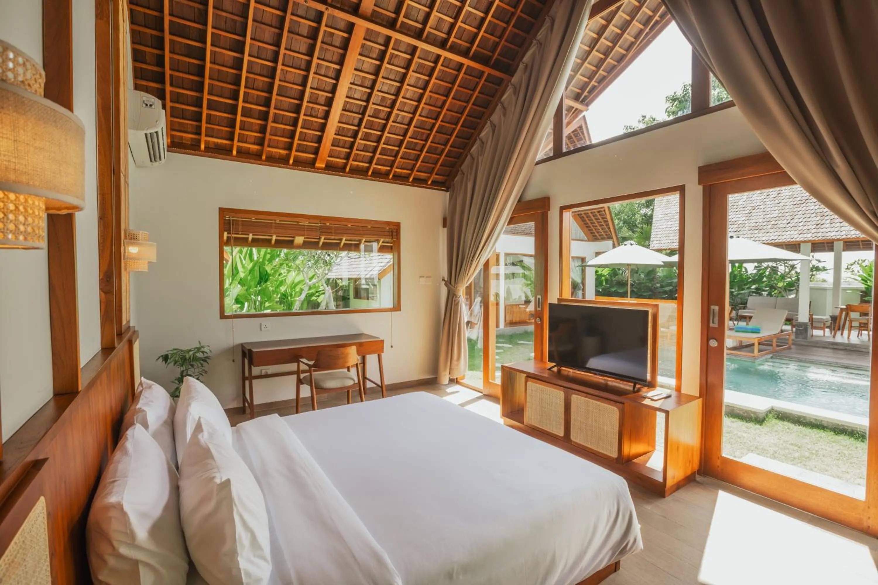Bed in Arpana Luxury Private Pool Villas