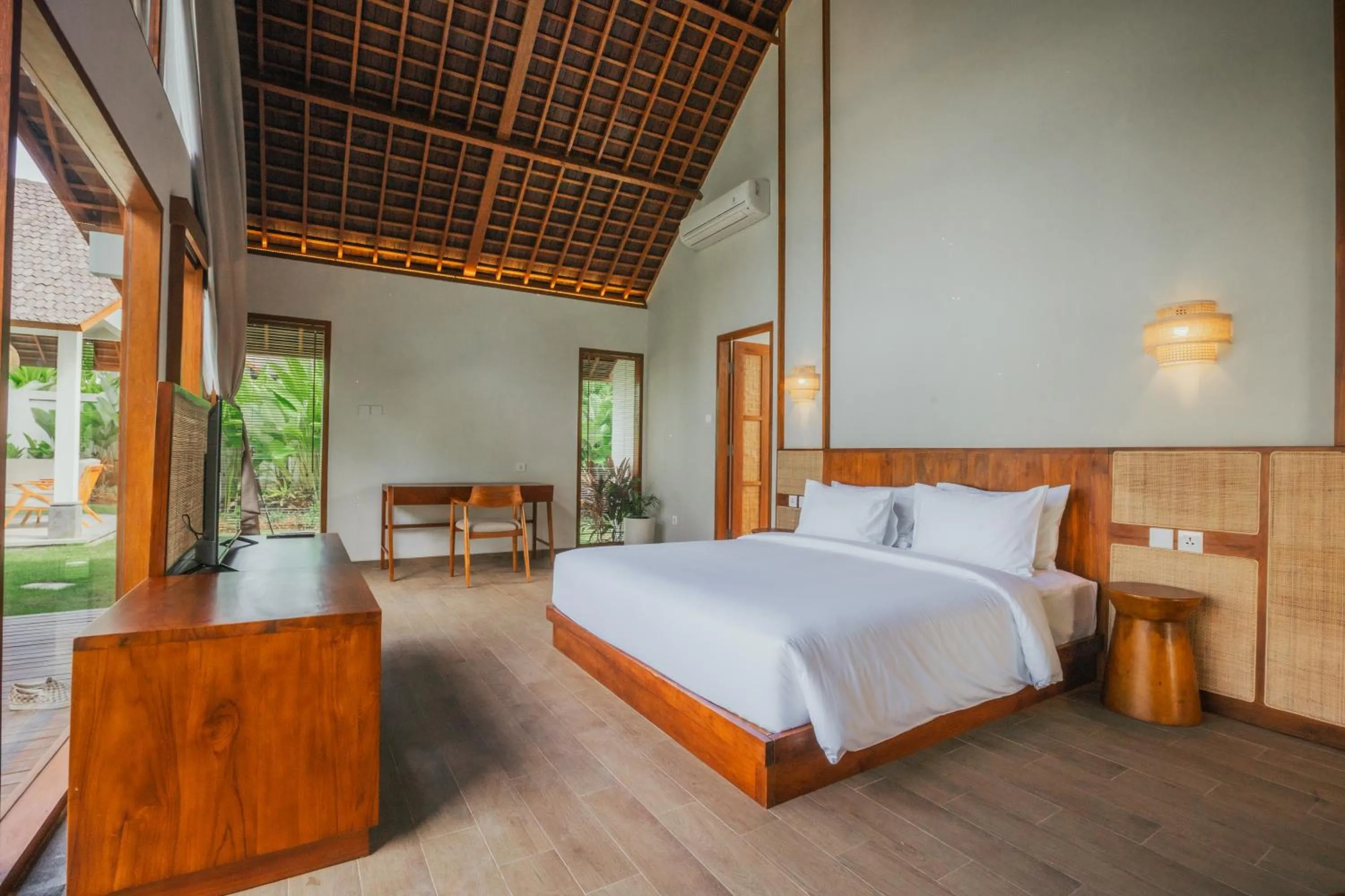 Bed in Arpana Luxury Private Pool Villas