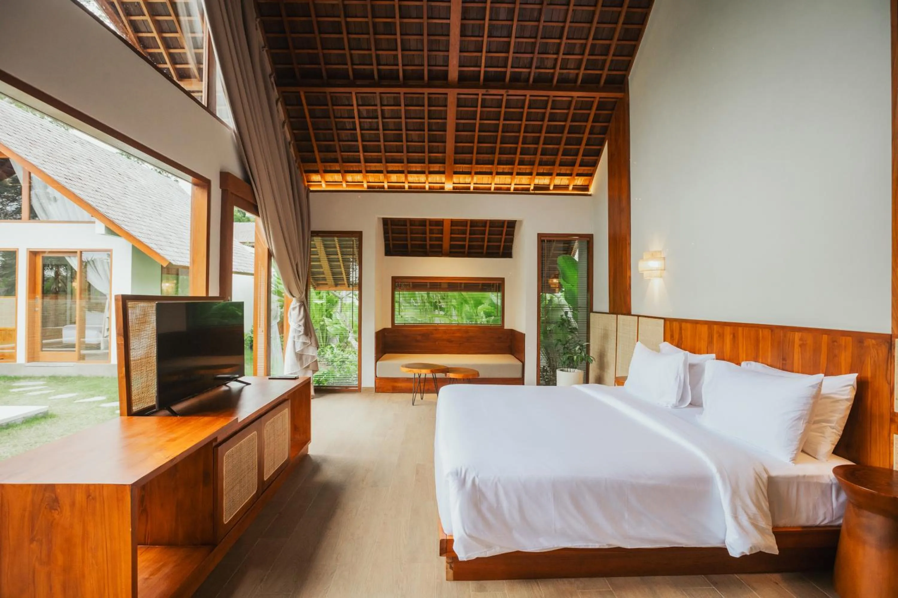Bed in Arpana Luxury Private Pool Villas