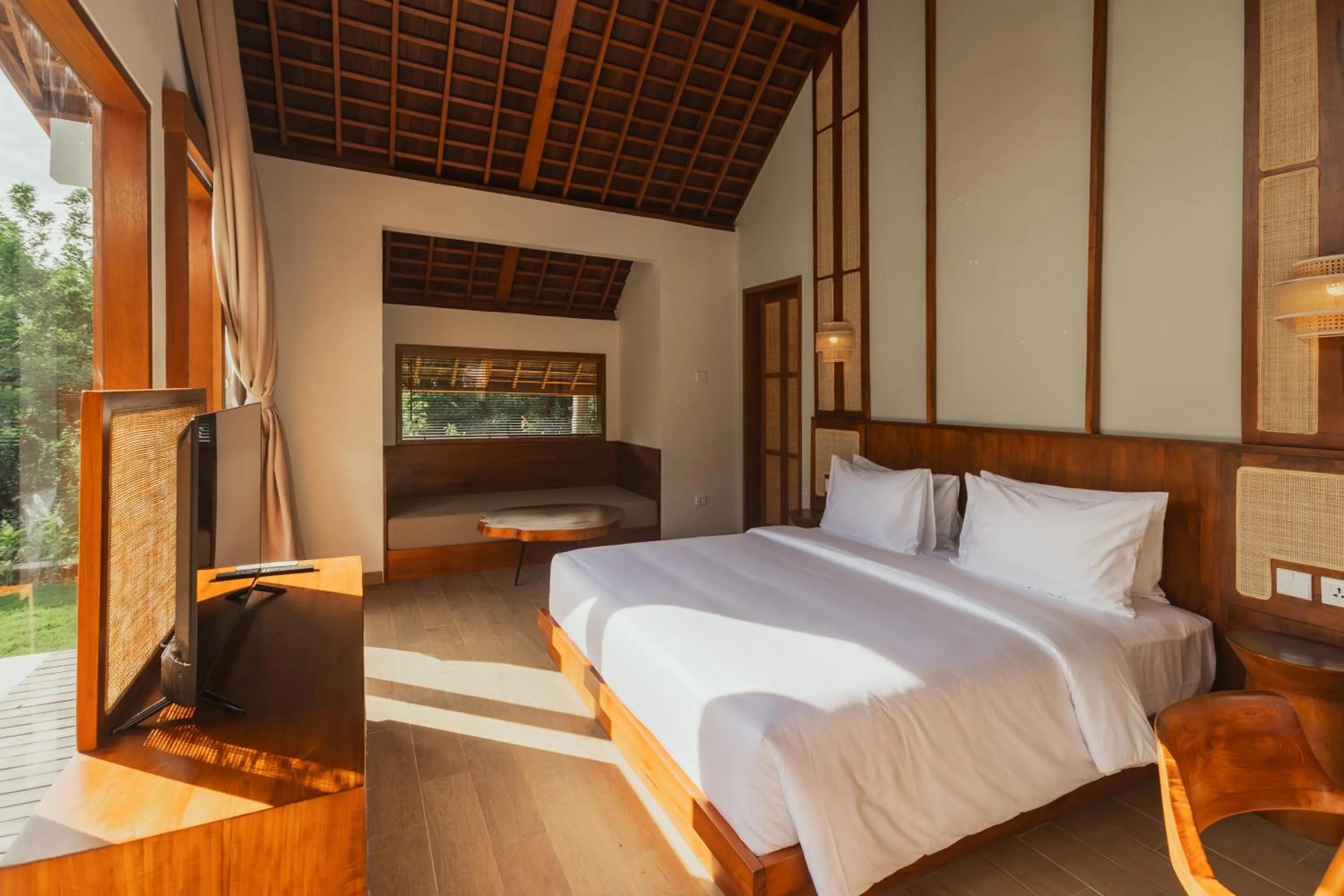 Bed in Arpana Luxury Private Pool Villas