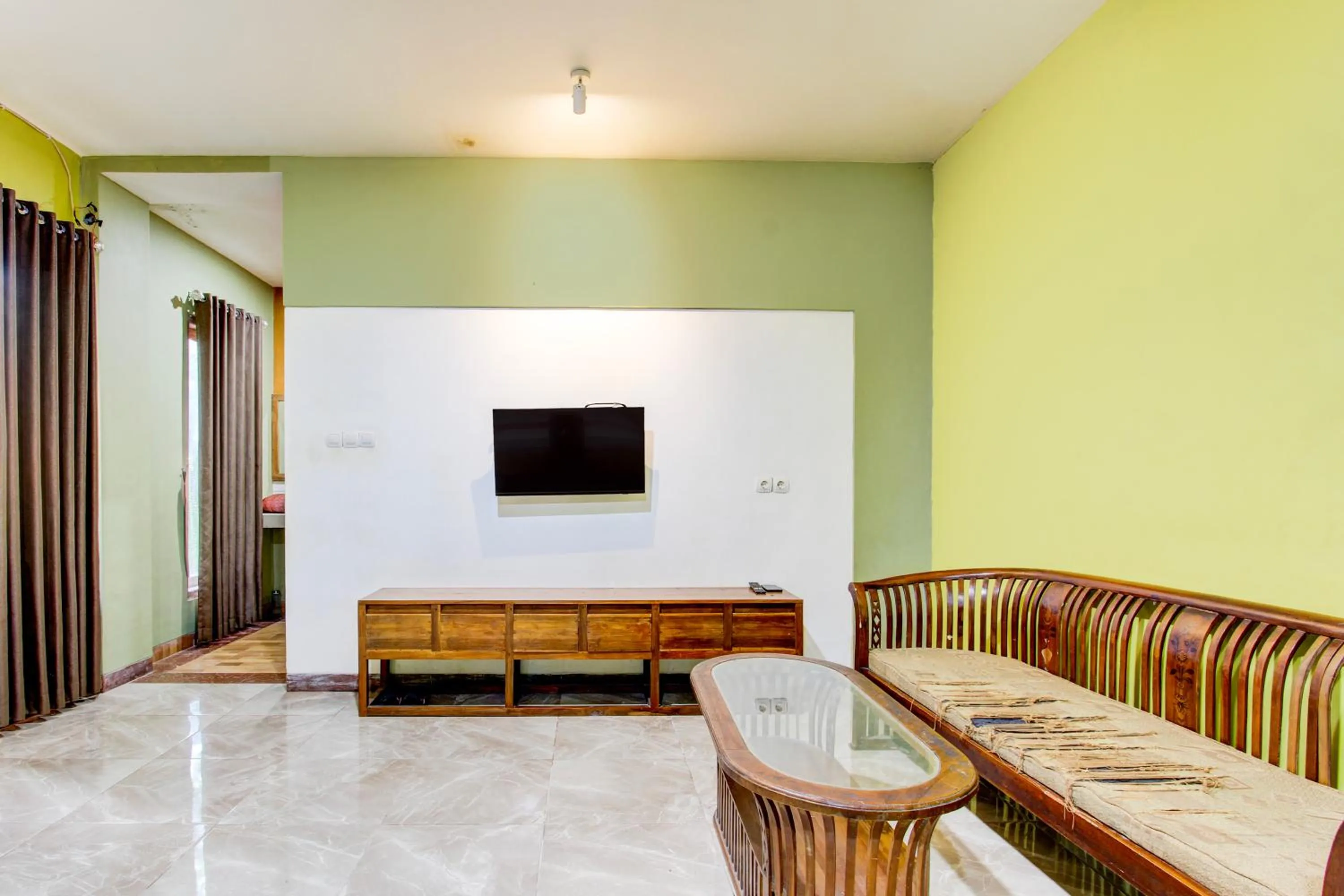 Seating area in Hotel O Penginapan Viki Syariah