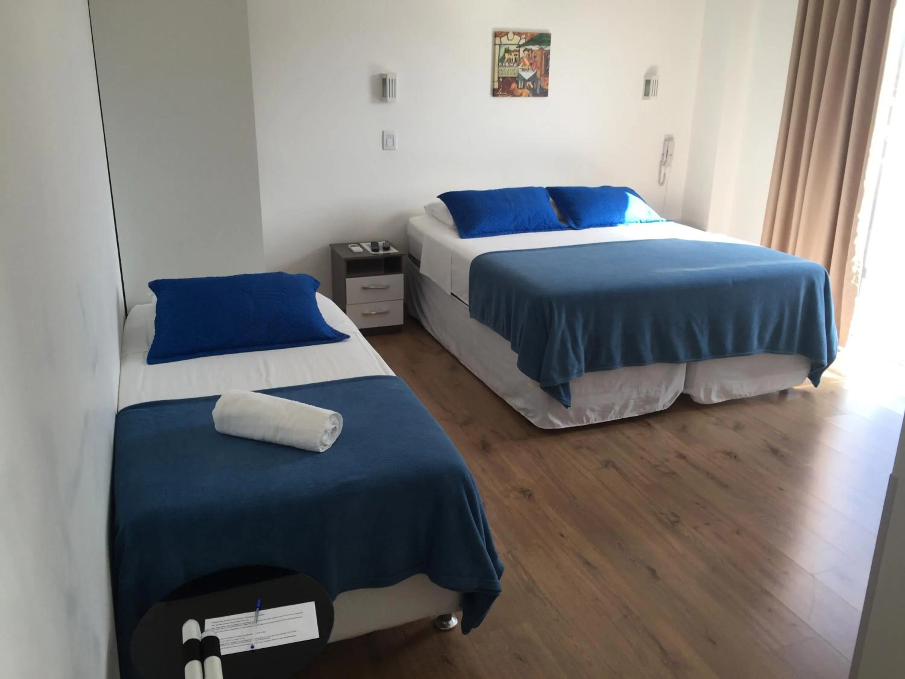 Bed in The Hyperion Boutique Hotel