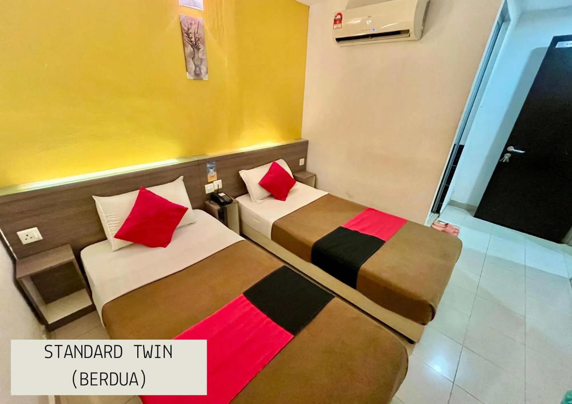 Bed in Yellow Mansion Hotel Melaka Raya