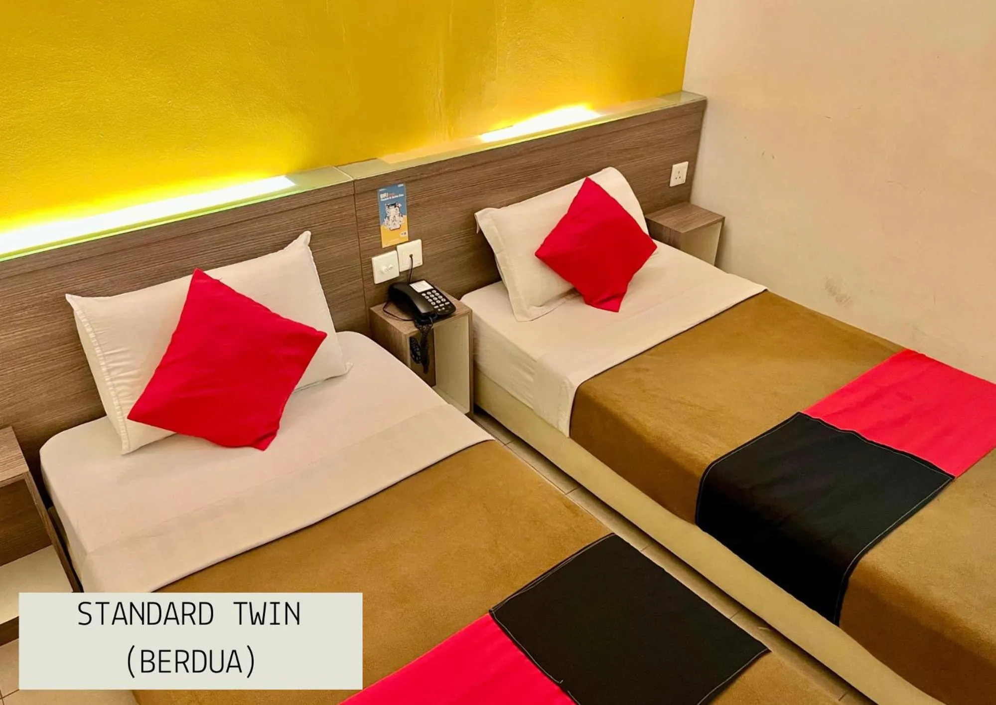 Bed in Yellow Mansion Hotel Melaka Raya